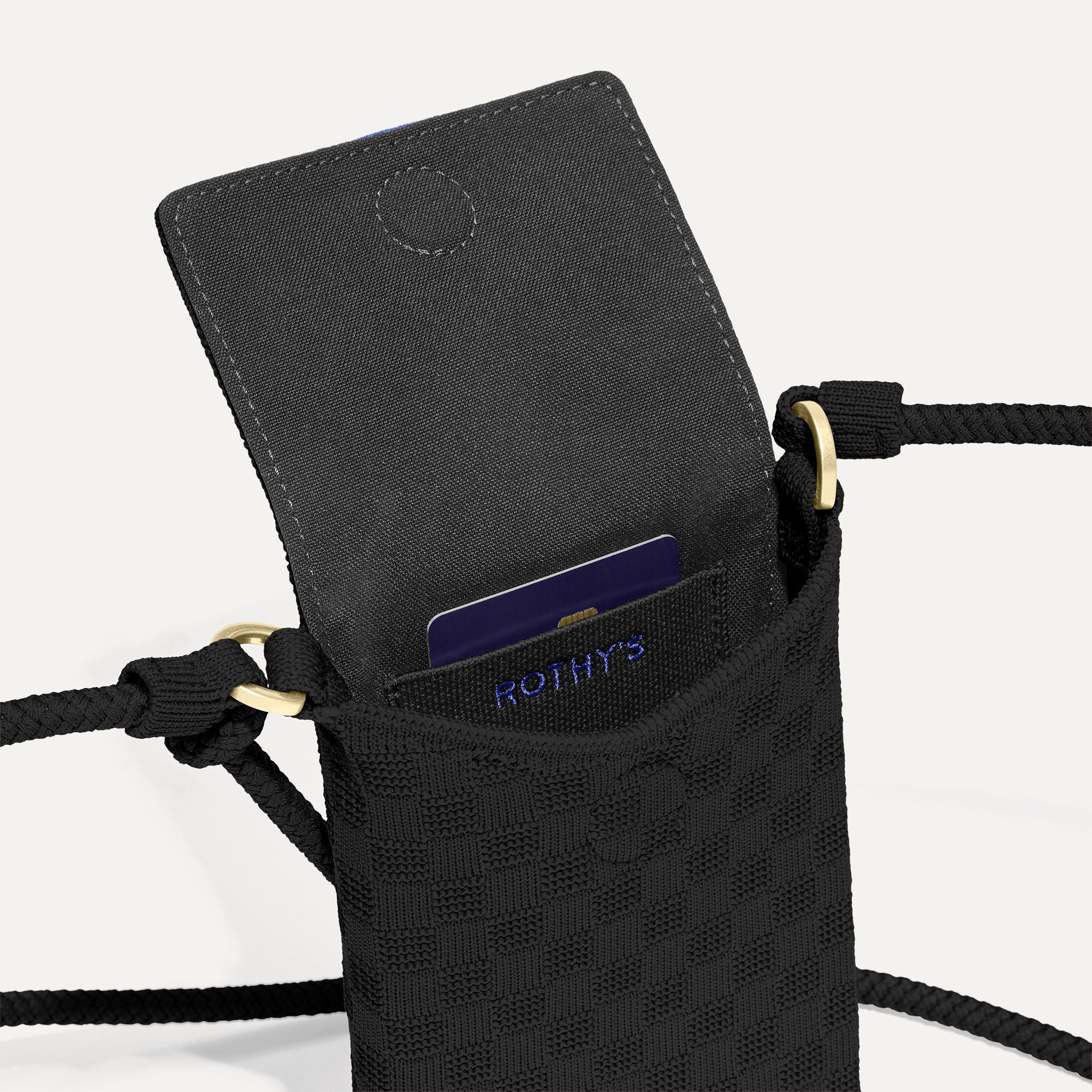 Close up of The Phone Crossbody interior slip pocket.