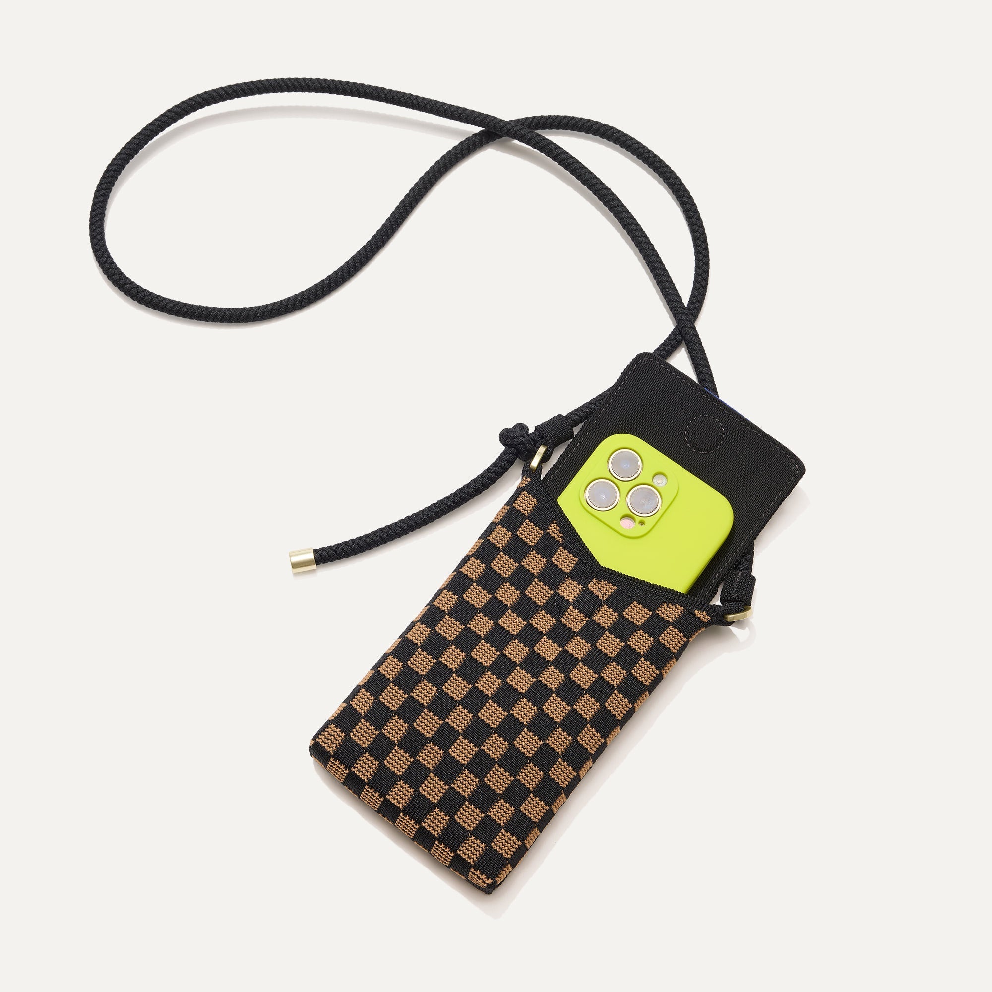 The Phone Crossbody in Midnight Song shown from above with an iPhone inside.