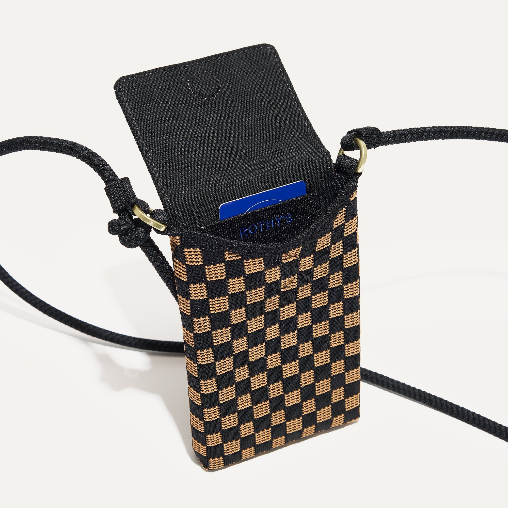 Close up of The Phone Crossbody interior slip pocket.