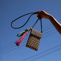 hover | Model wearing The Phone Crossbody in Midnight Song.