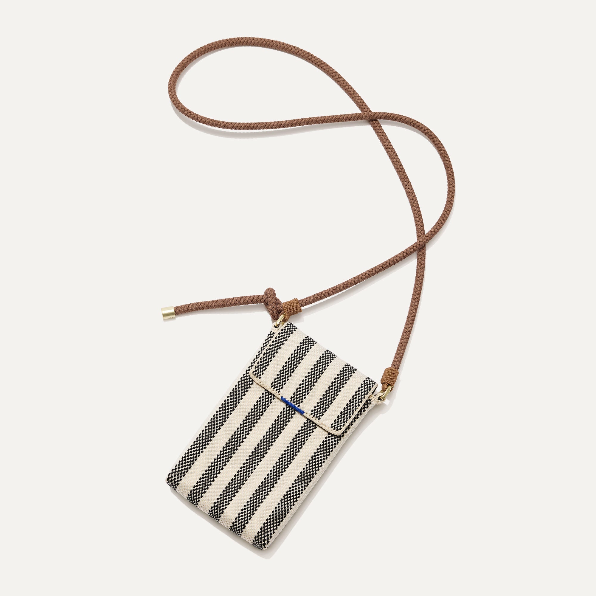 The Phone Crossbody in Cabana Stripe shown from above.