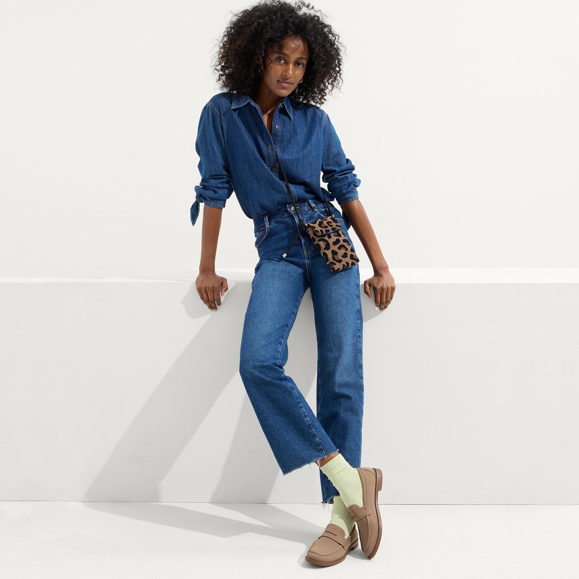 hover | Model wearing The ReVelvet™ Phone Crossbody in ReVelvet™ Cat.