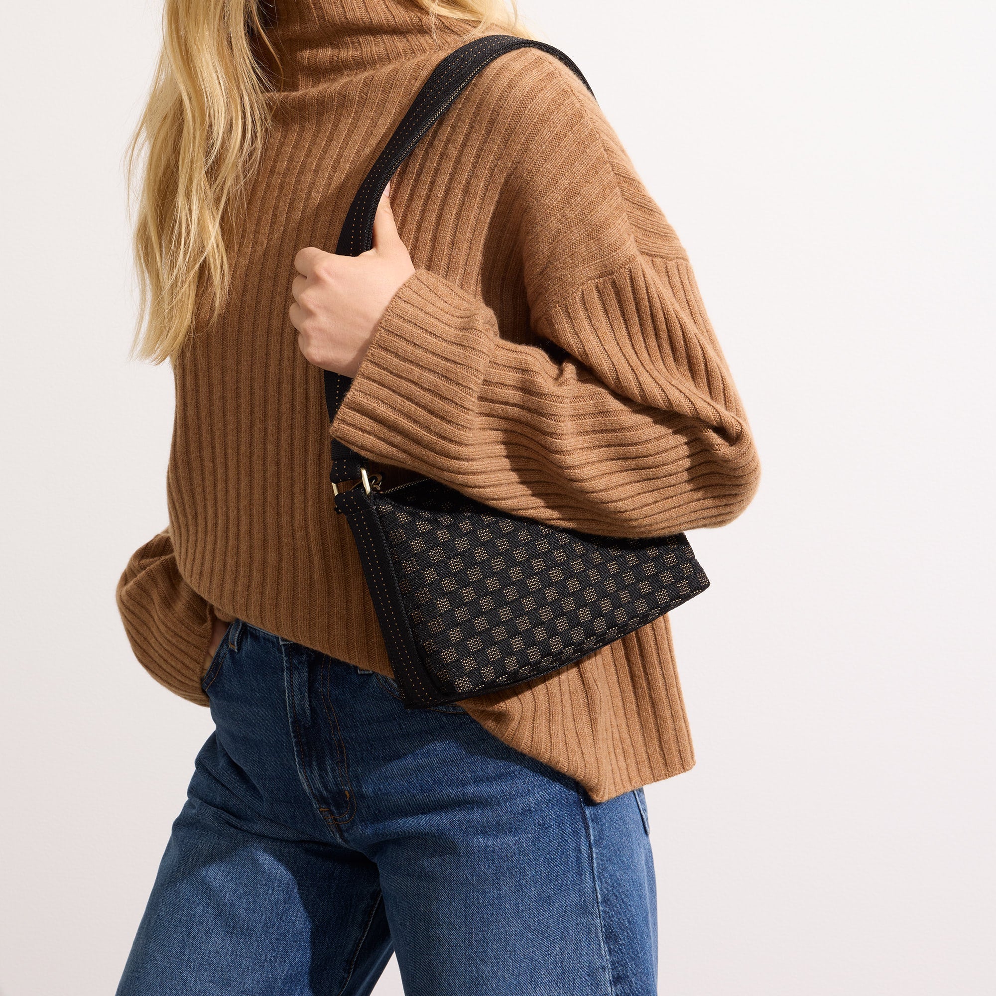 hover | The Casual Crossbody in Night Song, worn over the shoulder by a model, shown from the side. 