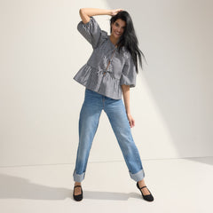 Alternate view of a model wearing The Max Square Mary Jane in Black Sand.