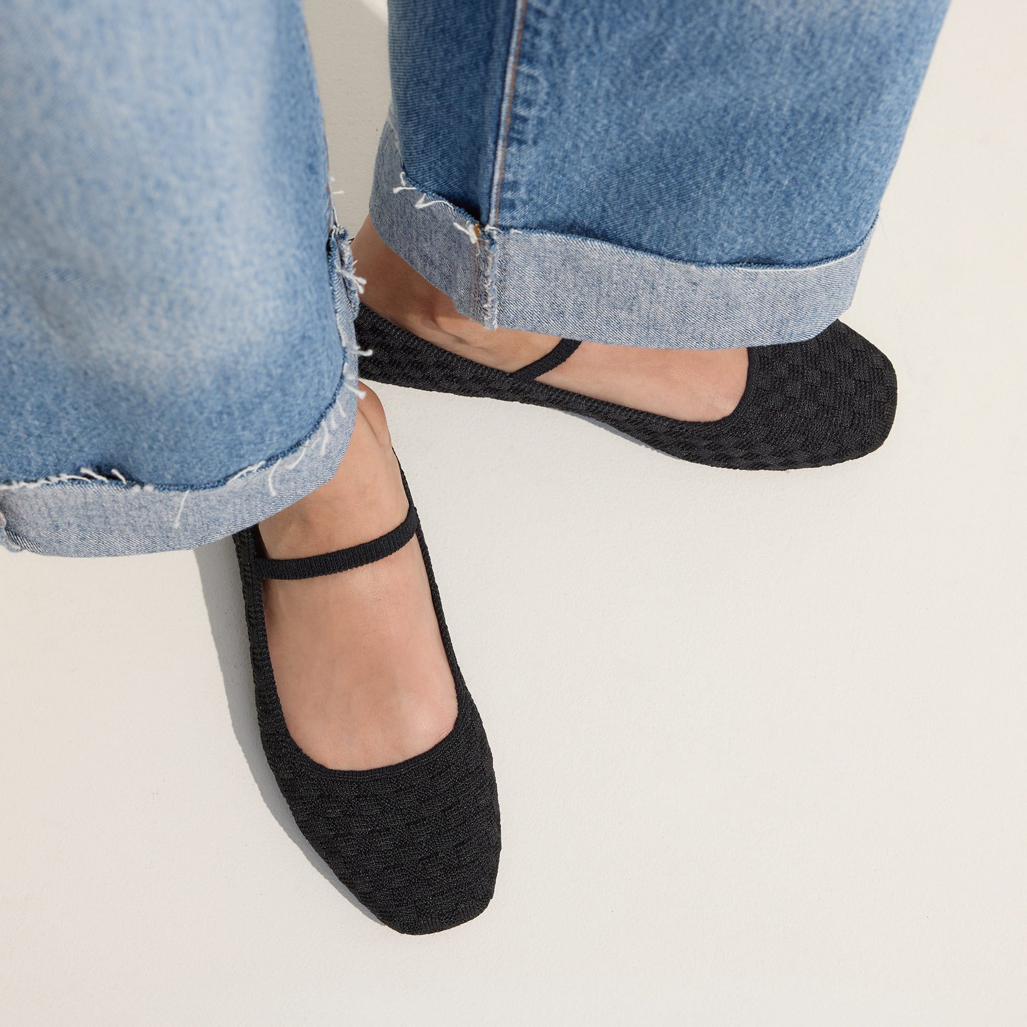 hover | Model wearing The Max Square Mary Jane in Black Sand.