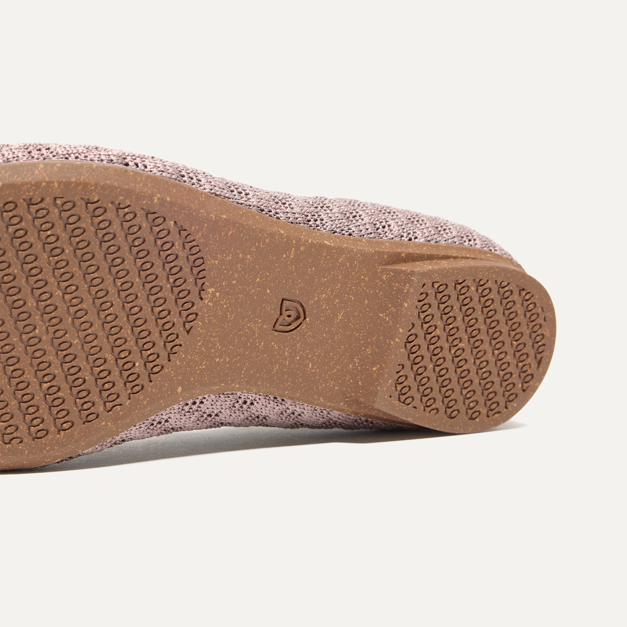 The sole of The Max Square Mary Jane in Dusty Lilac Basketweave shown in diagonal view.