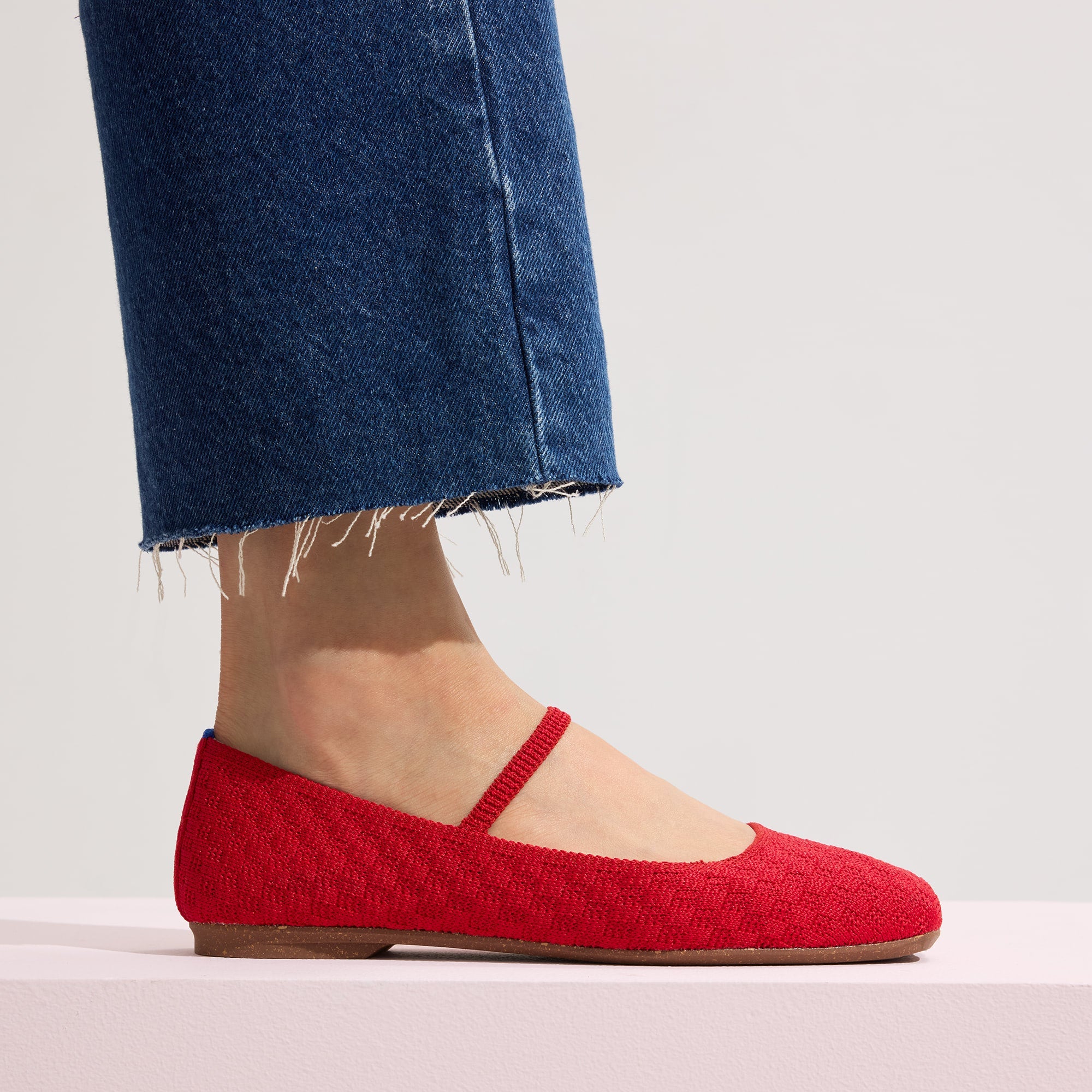 hover | Model wearing The Max Square Mary Jane in Red Crisp Basketweave.