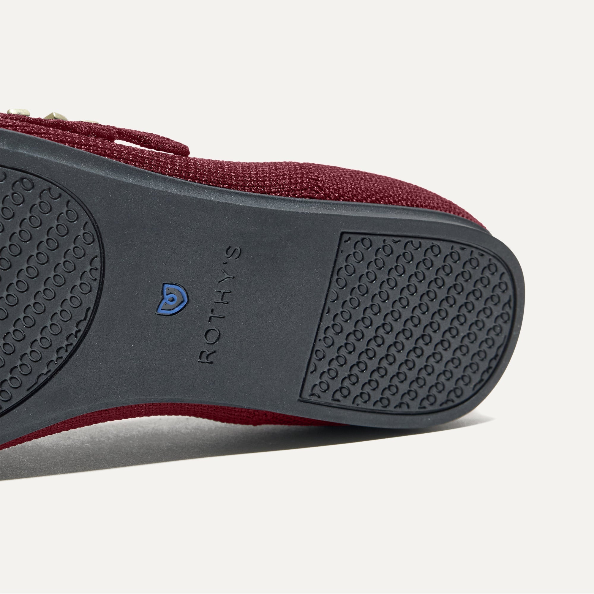 The sole of The Double Buckle Mary Jane in Cabernet.