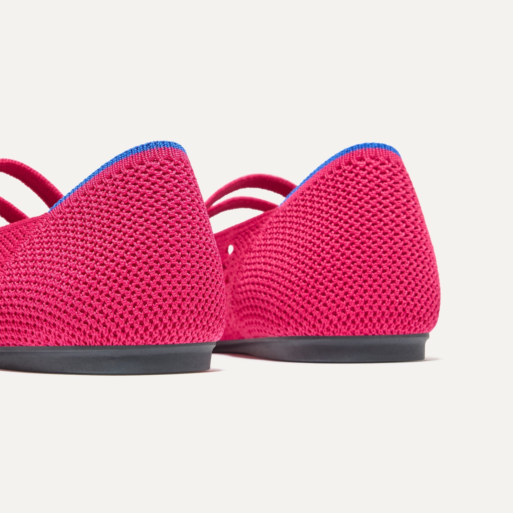 Close up of the heel of The Double Buckle Mary Jane in Rouge Crochet, with Rothy's signature blue halo.