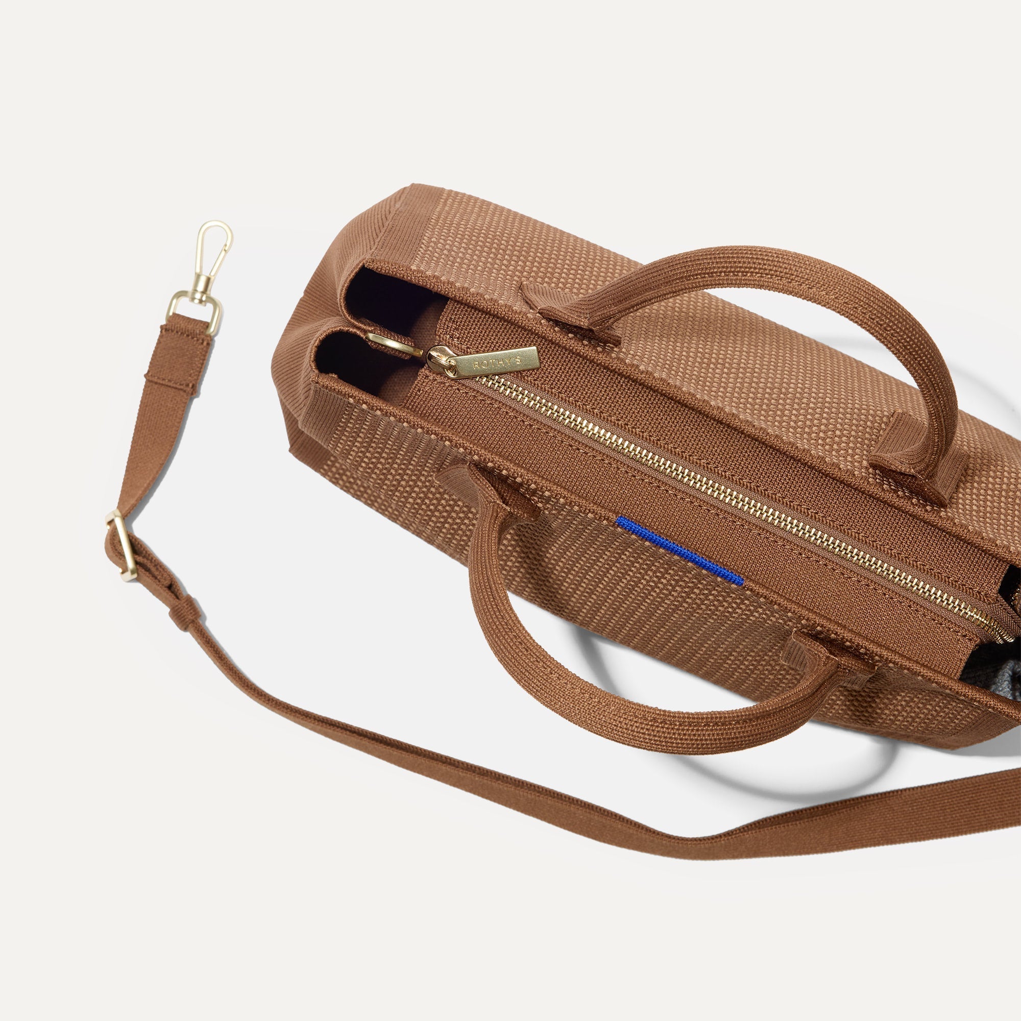 The Classic Handbag in Sierra Brown shown closed from the top with zipper closure.