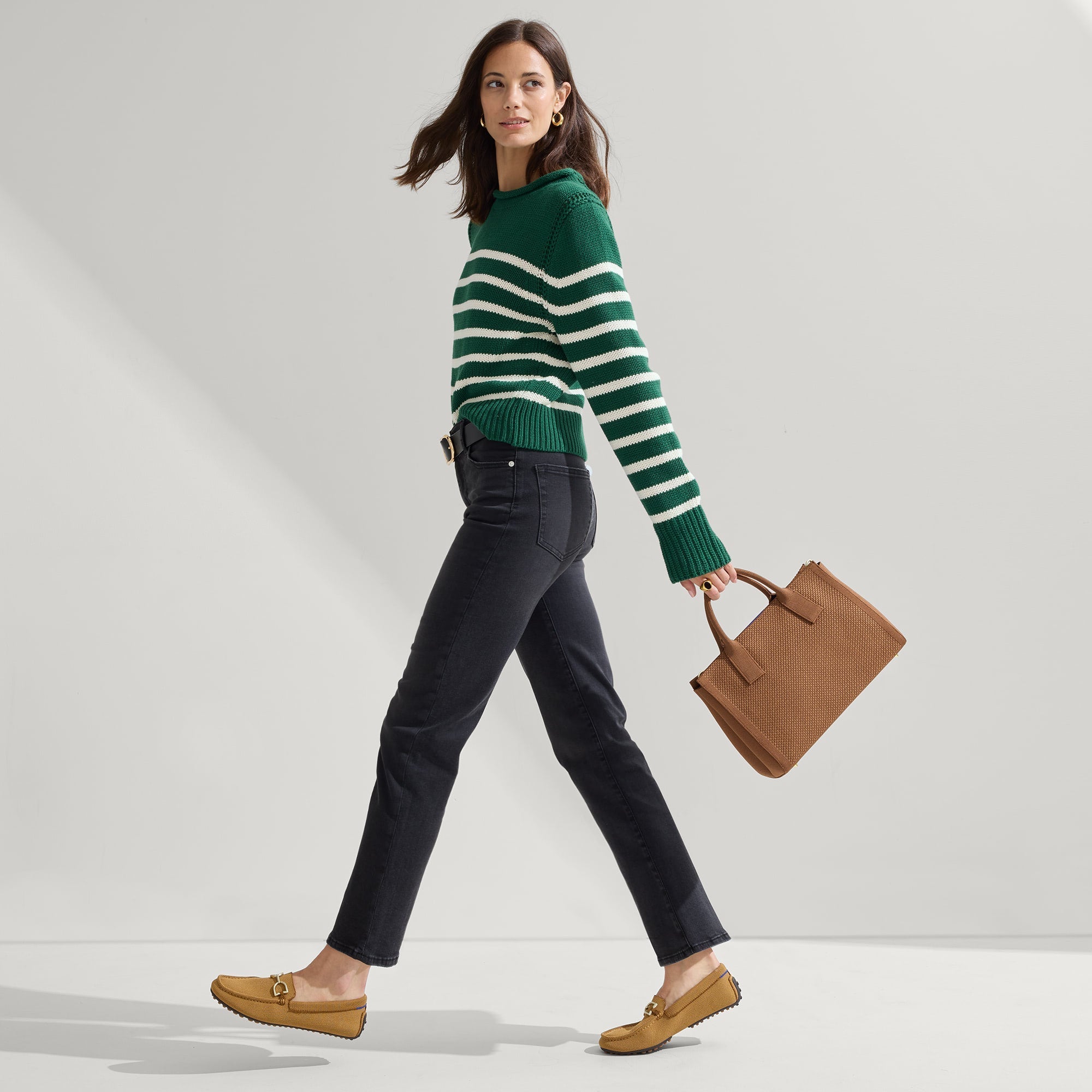 The Classic Handbag in Sierra Brown shown on model in a different pose.