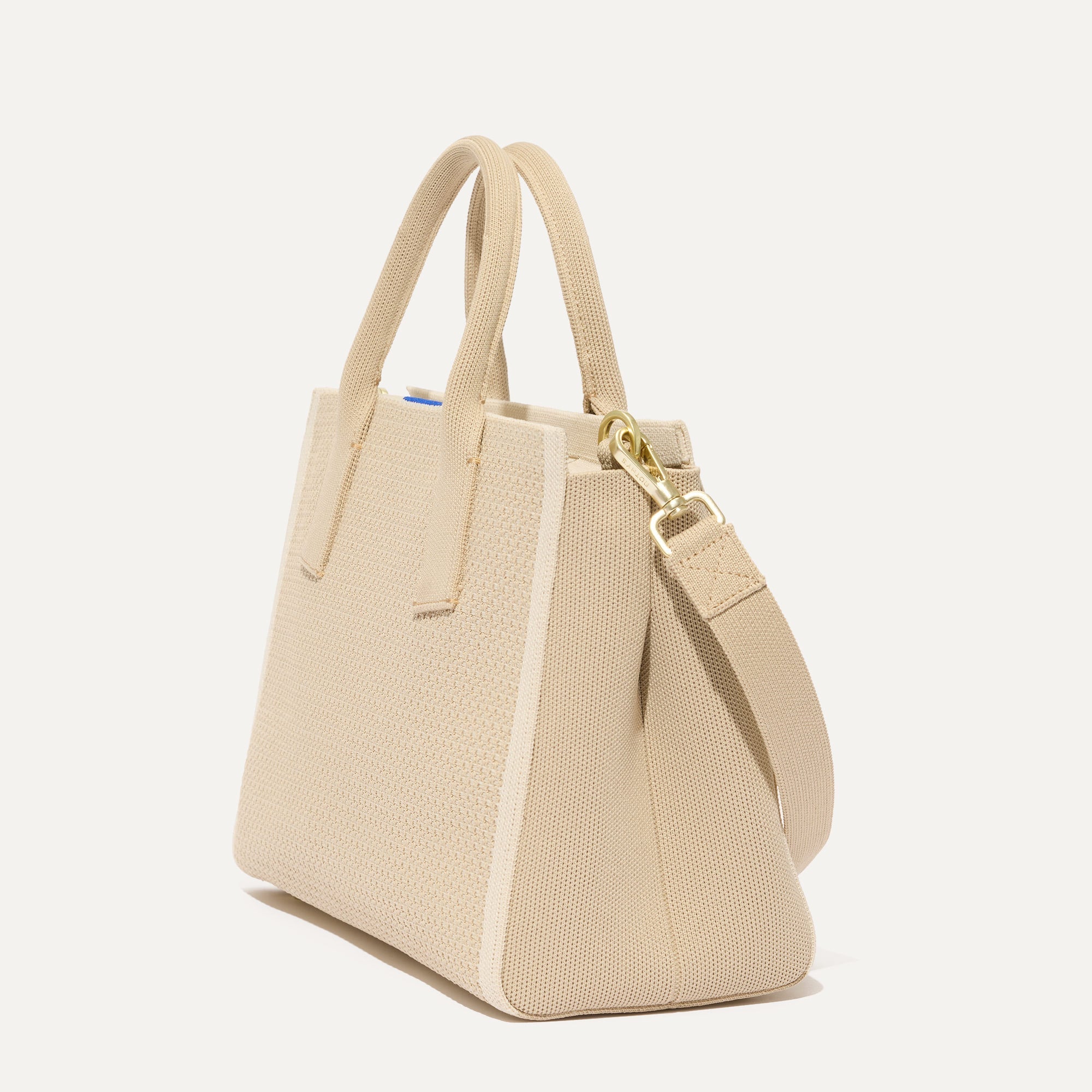 The Classic Handbag in Soft Sesame shown in diagonal view.