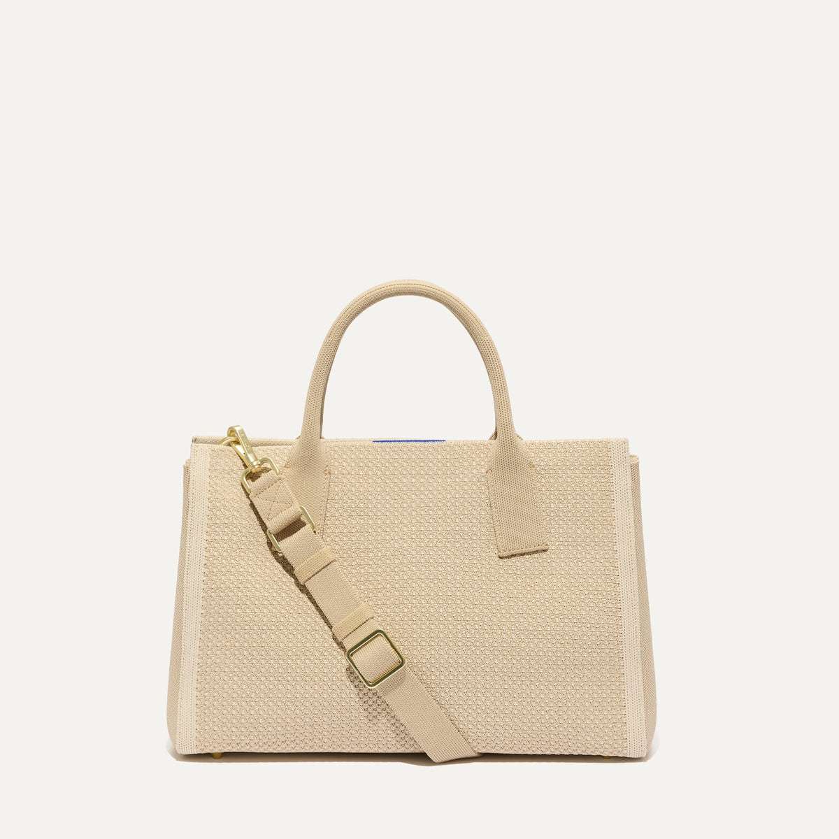PLP |The Classic Handbag in Soft Sesame shown from the front.
