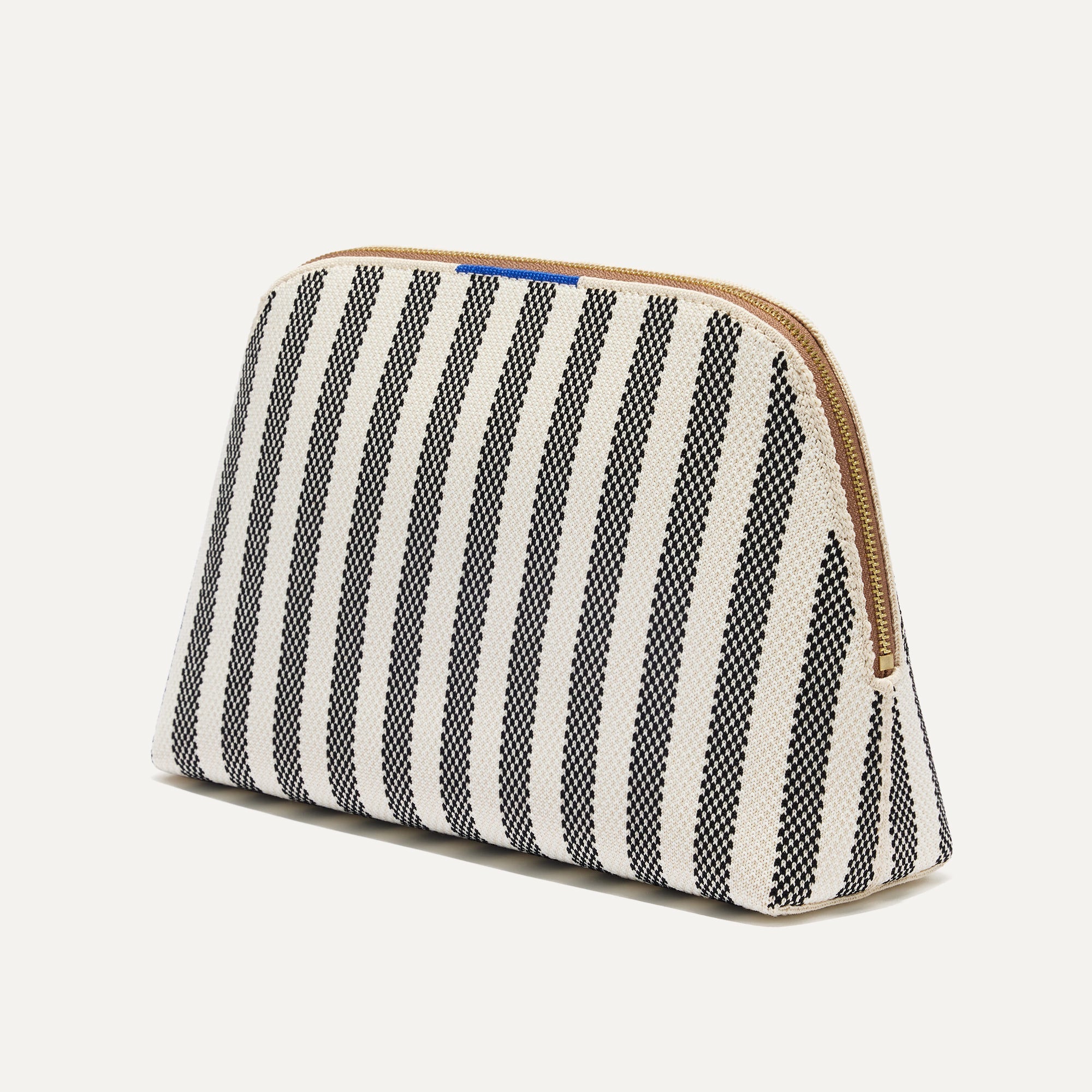 The large pouch of The Vanity Set in Cabana Stripe Micro Check shown in diagonal view.
