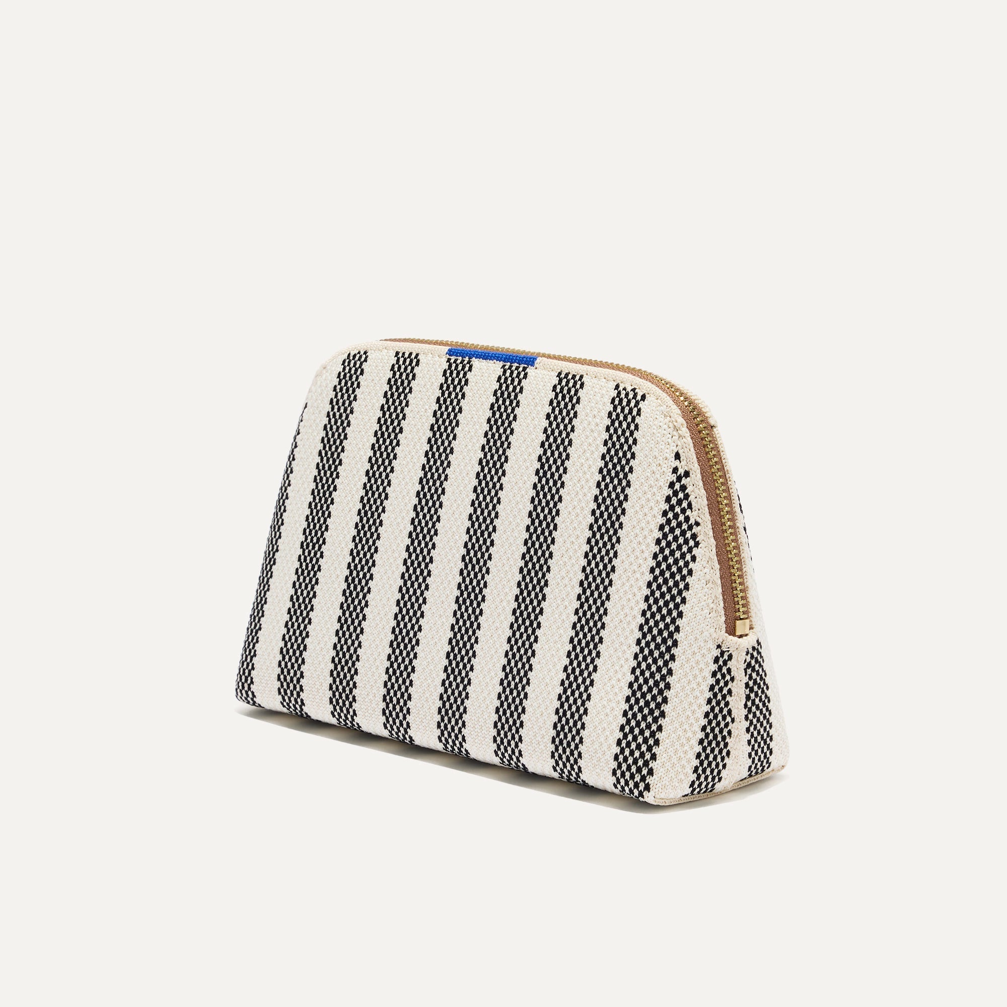 The small pouch of The Vanity Set in Cabana Stripe Check shown in diagonal view.