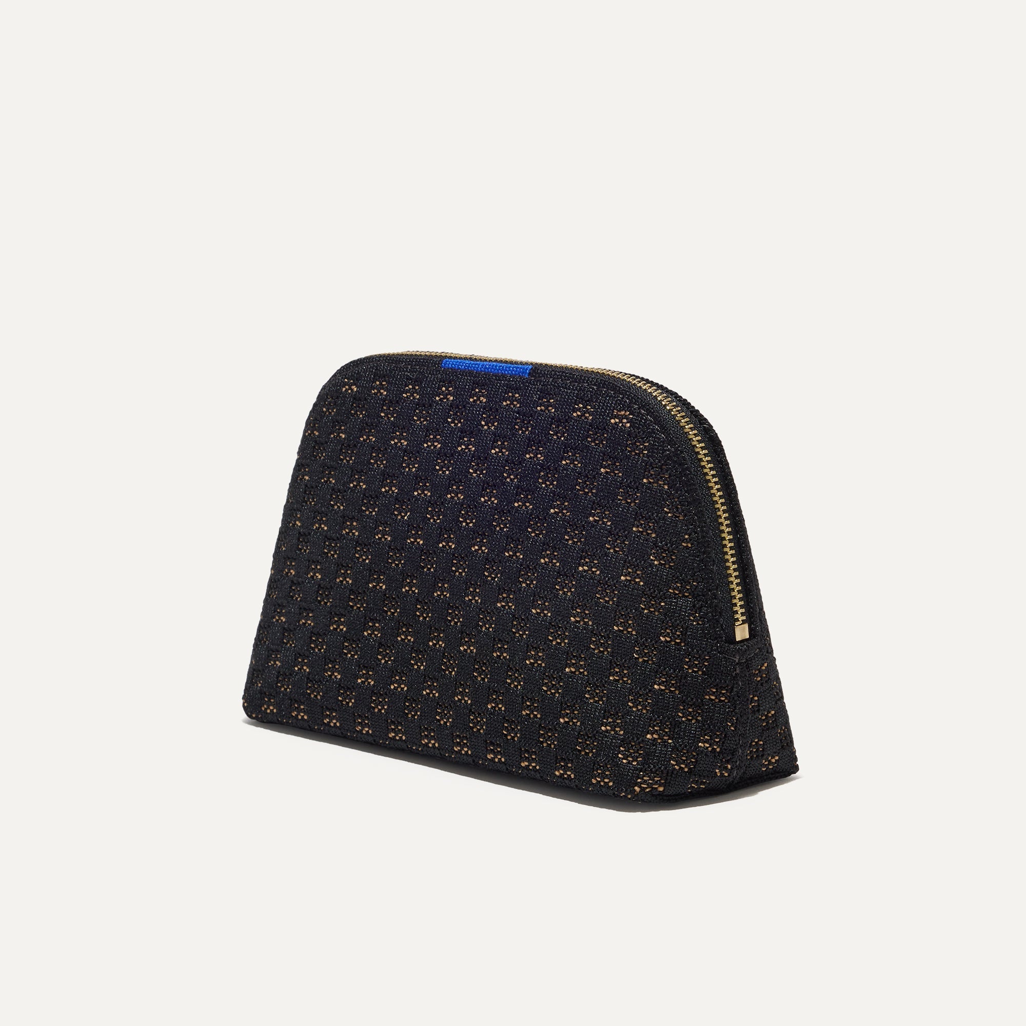 The small pouch of The Vanity Set in Night Song shown in diagonal view.