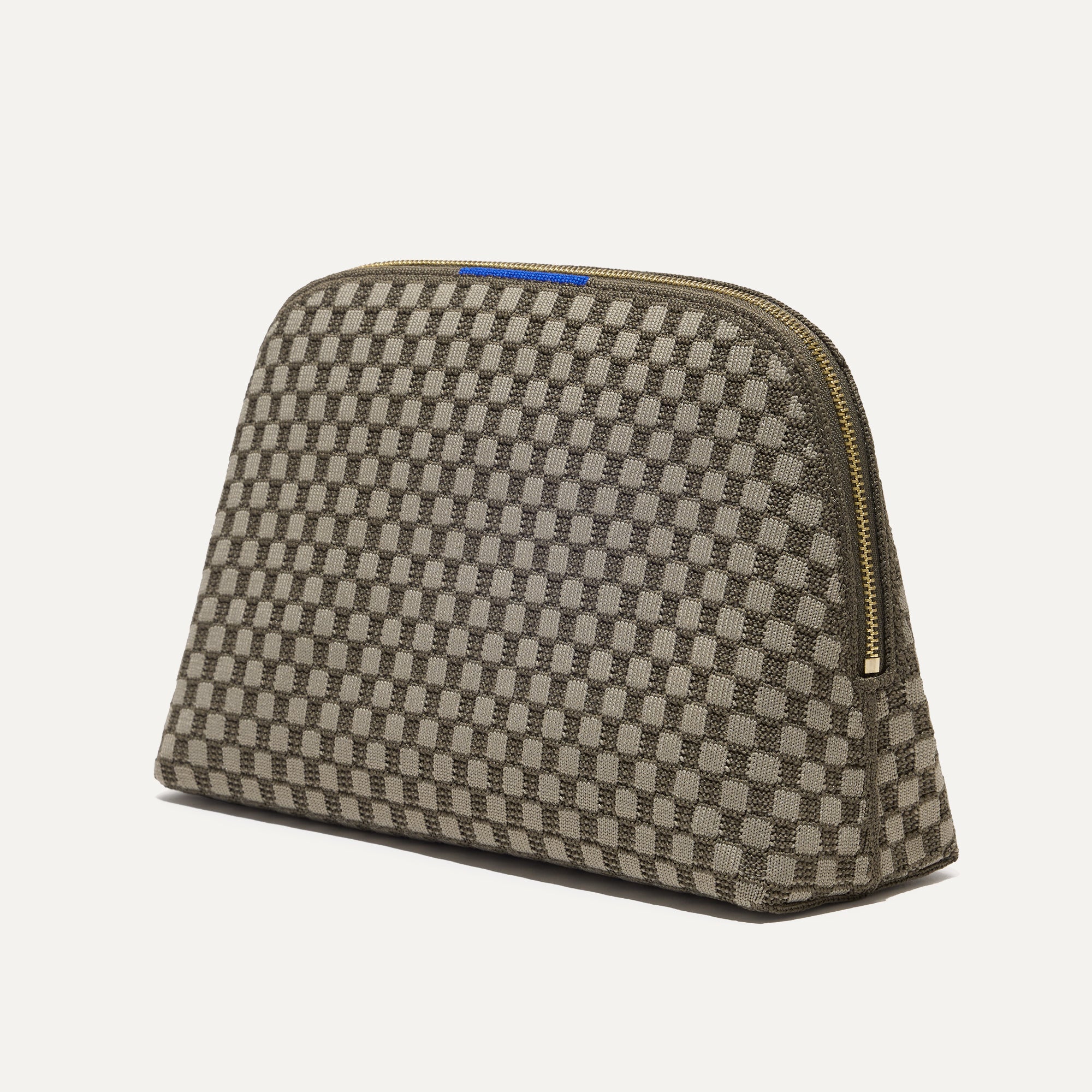 The large pouch of The Vanity Set in Safari Green shown in diagonal view.