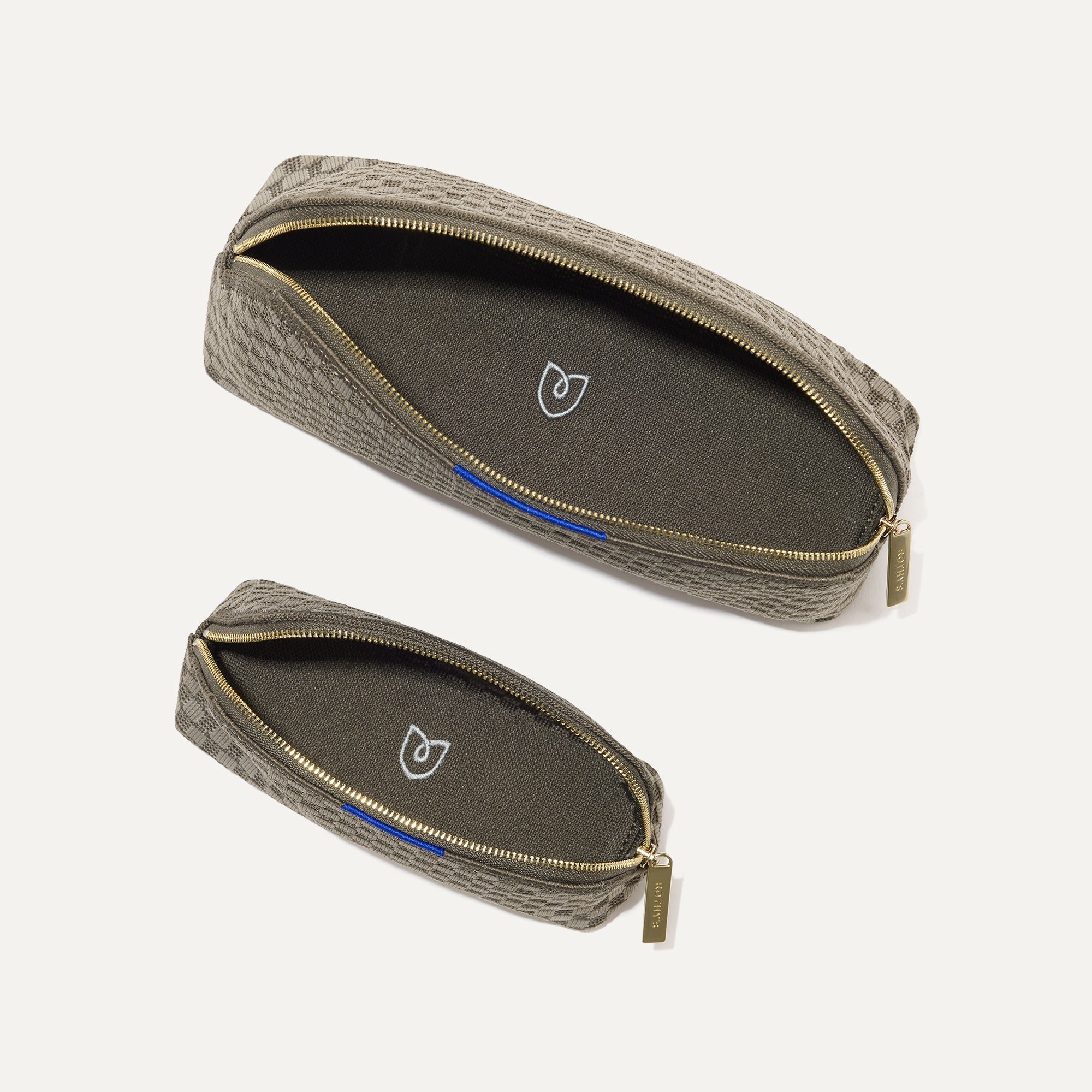 The Vanity Set in Safari Green shown from the top with zipper closure open.