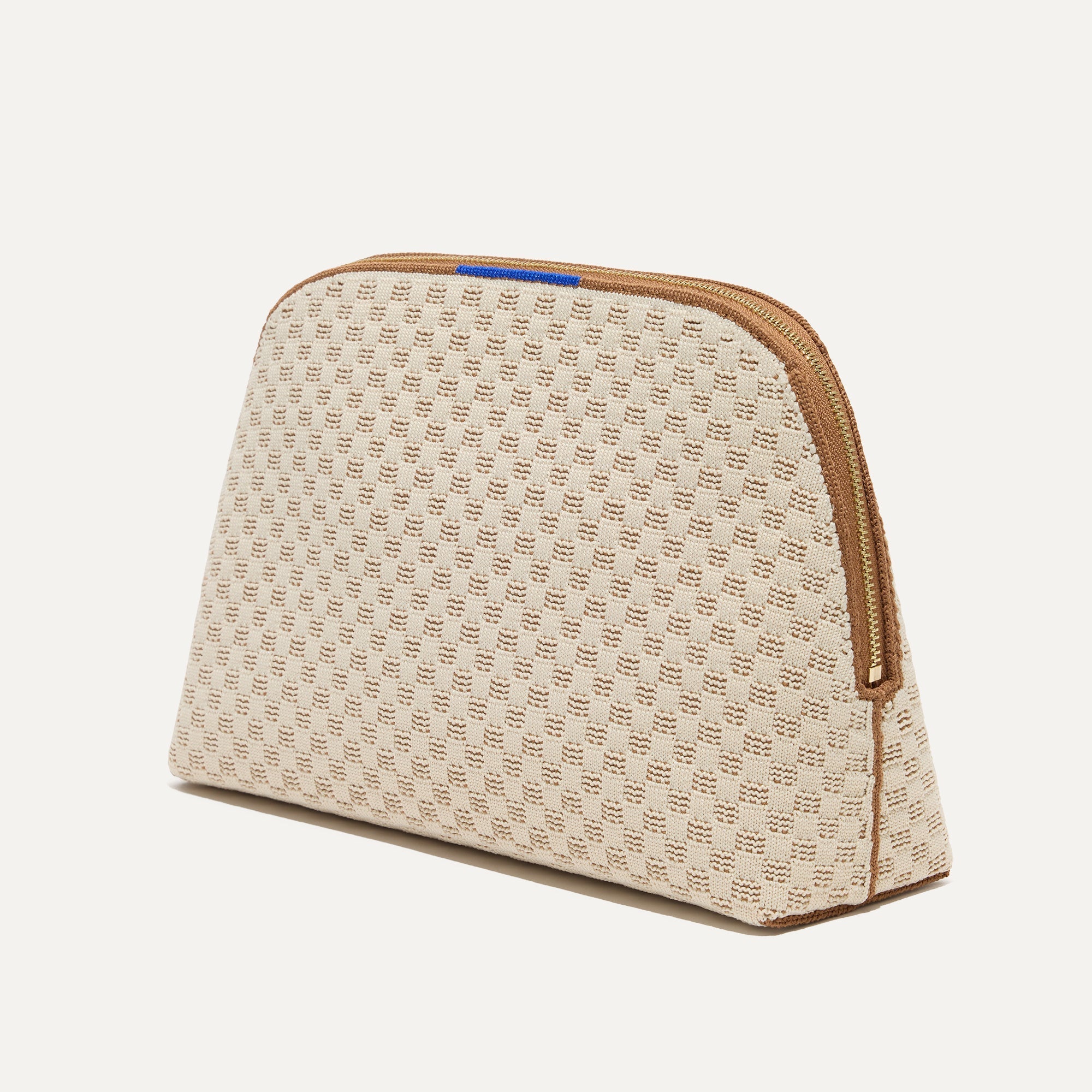 The large pouch of The Vanity Set in Vanilla Wafer shown in diagonal view.