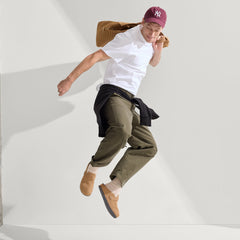 Alternate view of a model wearing The Men's Clog in Butternut.