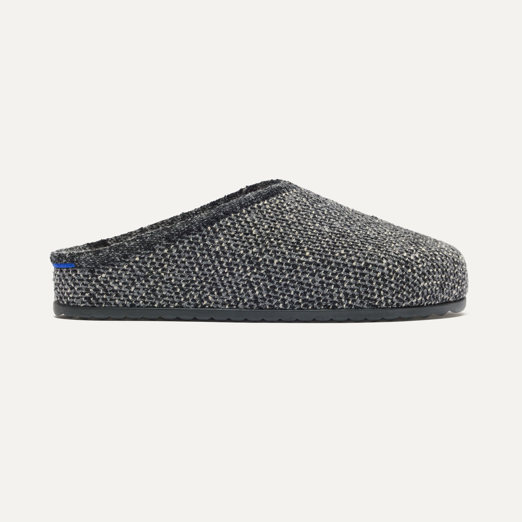 The Cozy Clog in Black Sesame Bouclé shown from the side.