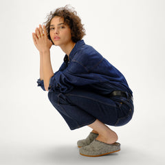 Alternate view of a model wearing The Cozy Clog in Cookies and Cream Bouclé.