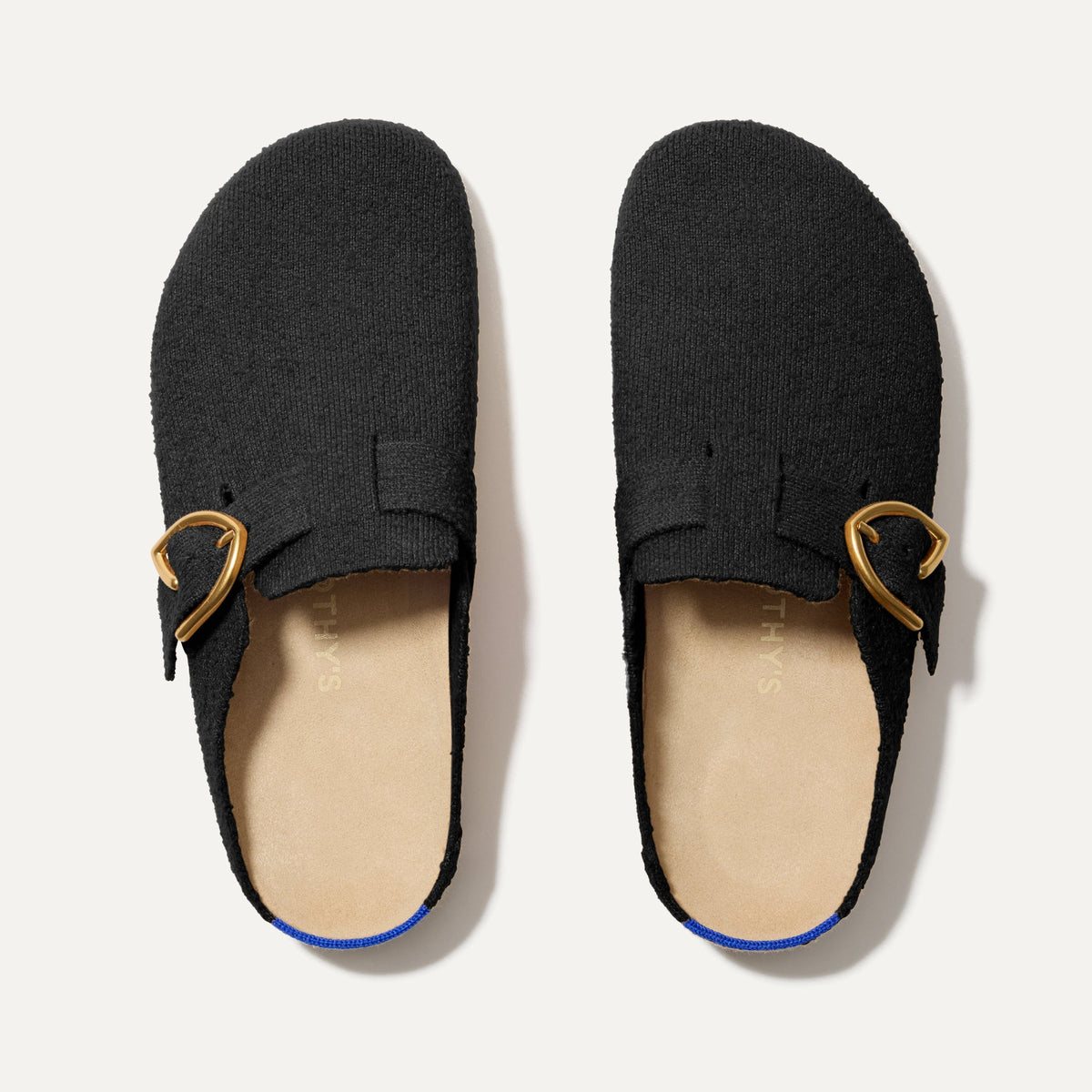 The Buckle Clog in Soft Black Bouclé shown from the top.