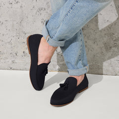 hover | Model wearing The Ravello Tassel Loafer in Black.