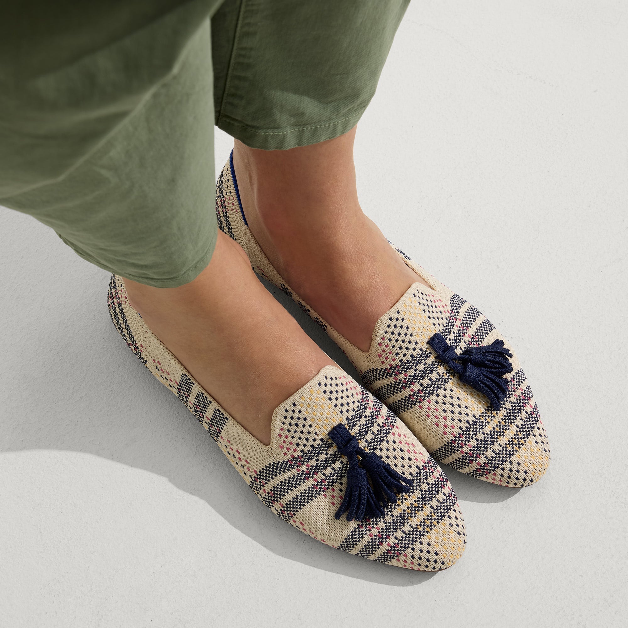 hover | Model wearing The Almond Tassel Loafer in Spring Plaid.