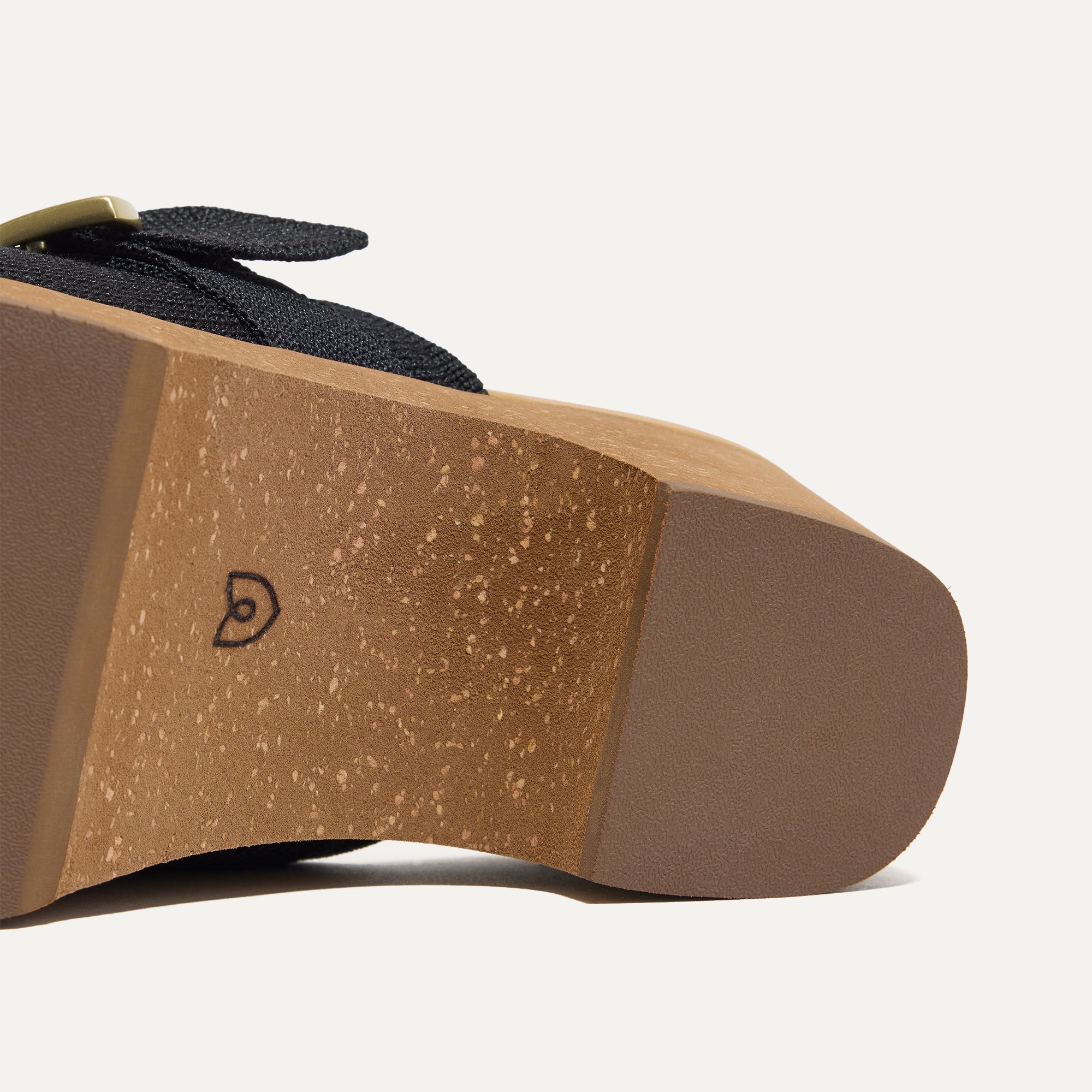 Close up of the outsoles of The Classic Clog in Black.