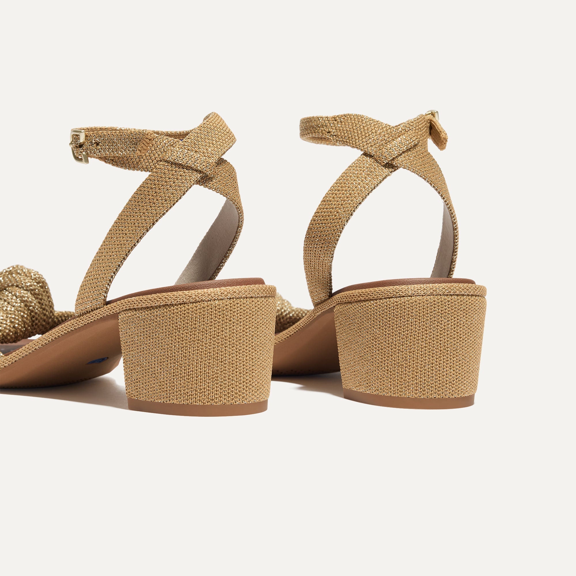 Close up of the heel of The Knot Sandal in Golden Sun.