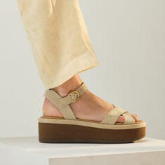hover | Model wearing The Criss-Cross Lightweight Wedge Sandal in Aurora.