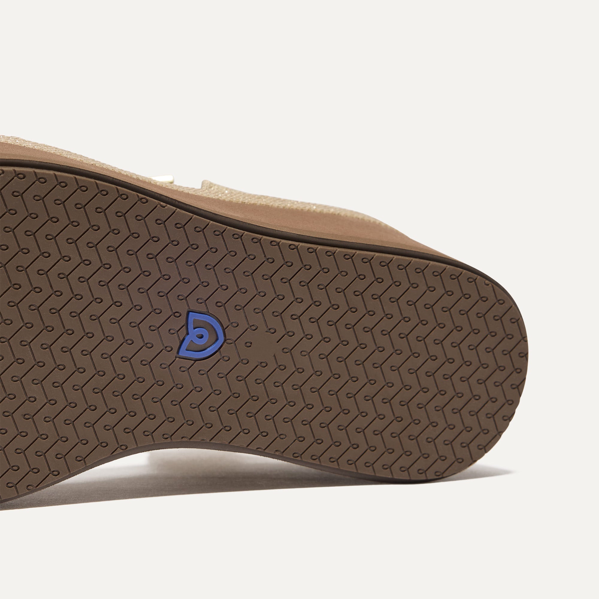 Close up of the outsole of The Criss-Cross Lightweight Wedge Sandal in Aurora.