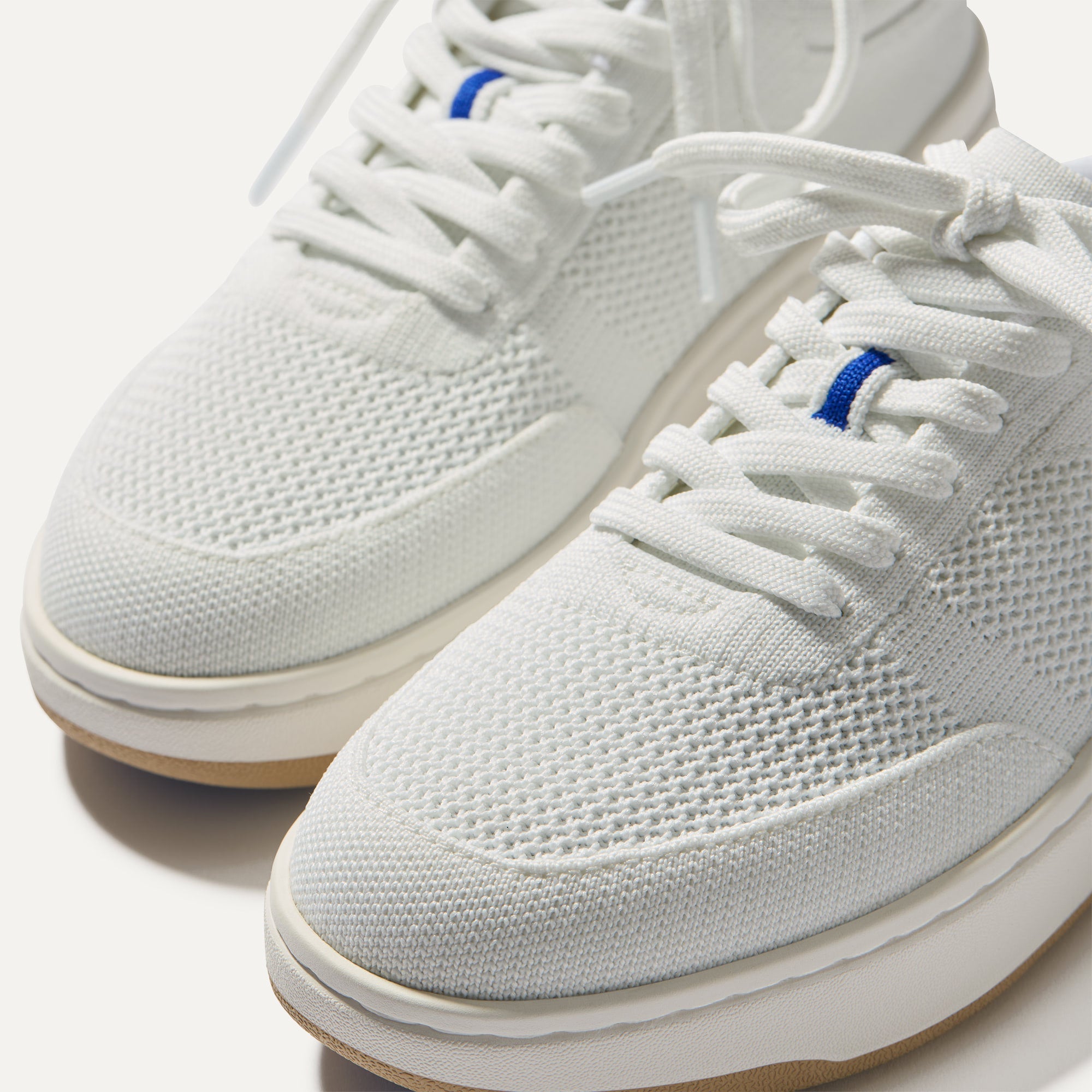 Close up of the laces of The Court Sneaker in Bright White.