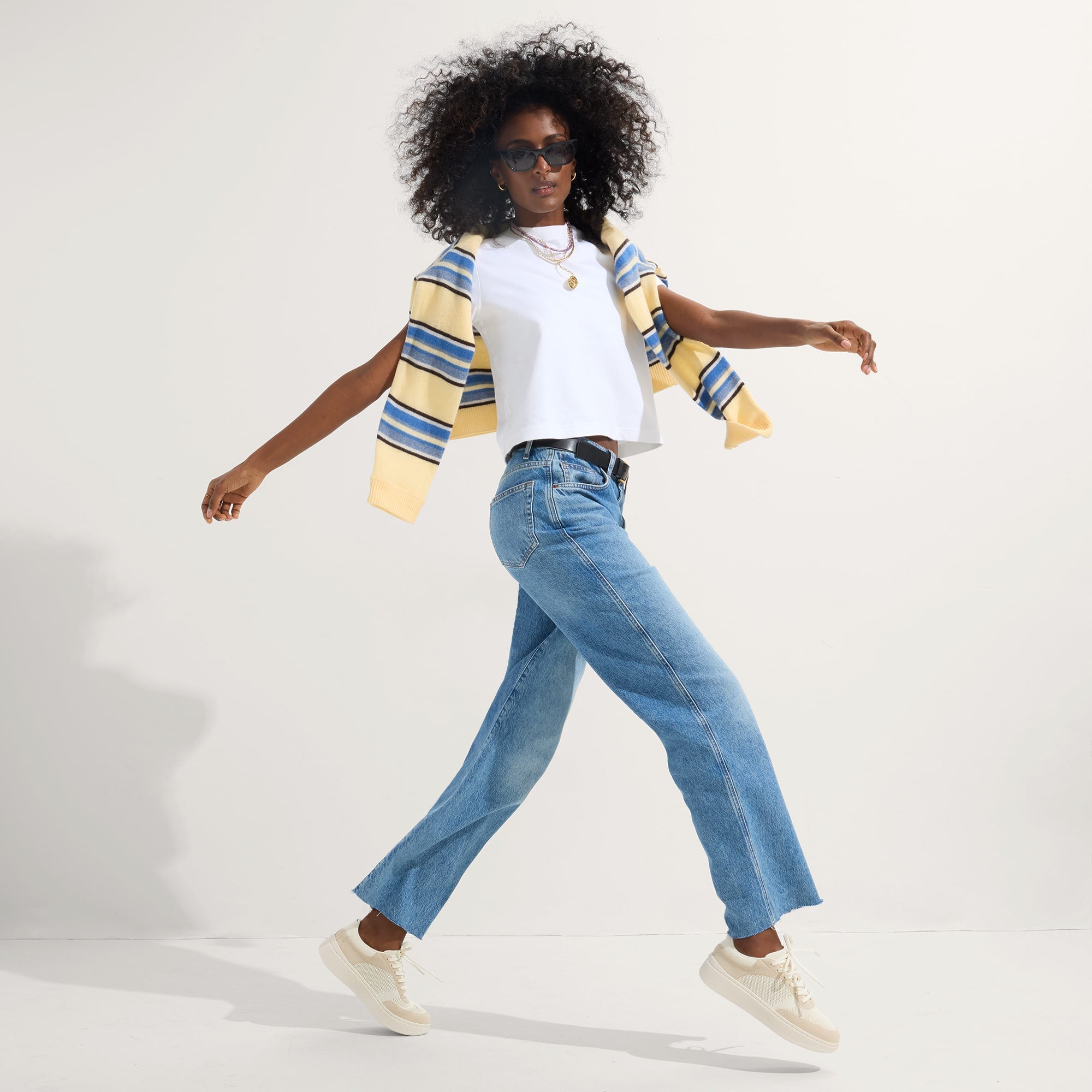 Alternate view of a model wearing The Court Sneaker in Sand Dune.