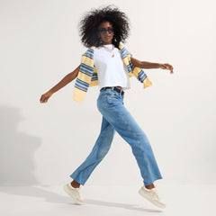 Alternate view of a model wearing The Court Sneaker in Sand Dune.