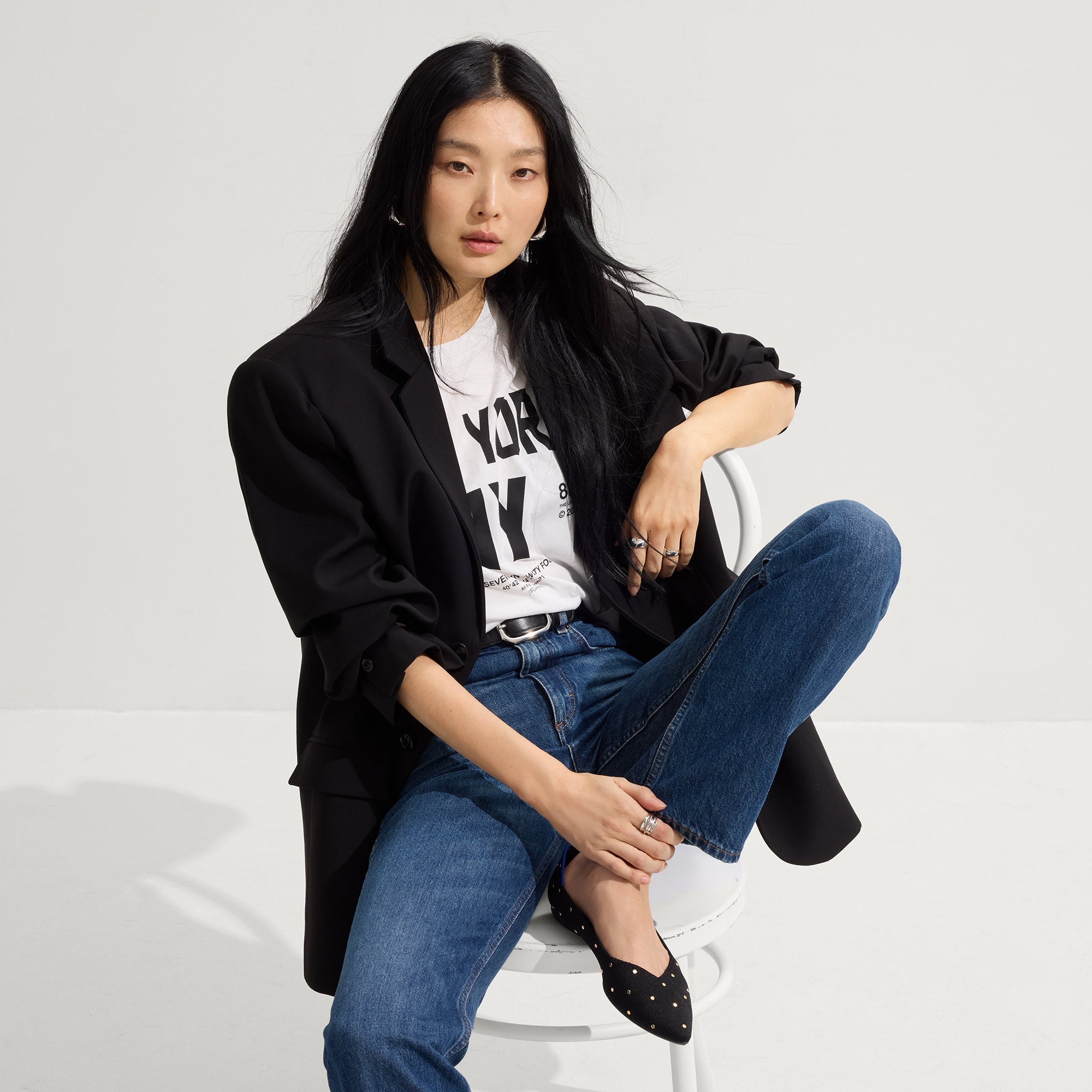 Alternate view of a model wearing The Point II in Studded Black.