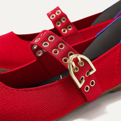 Close up of the buckle hardware and grommets on the straps of The Ballet Mary Jane in Cherry.