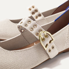 Close up of the buckle hardware and grommets on the straps of The Ballet Mary Jane in Conch.