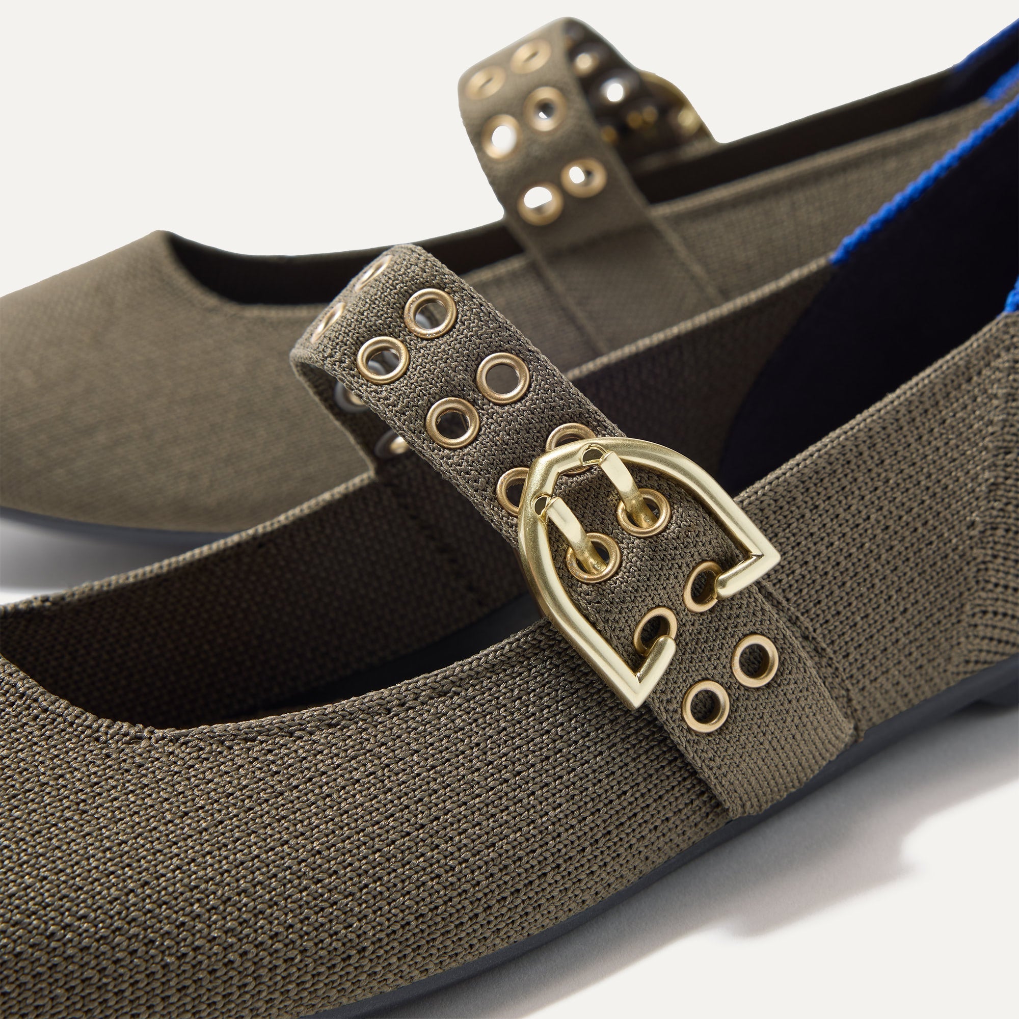 Close up of the buckle hardware and grommets on the straps of The Ballet Mary Jane in Safari.