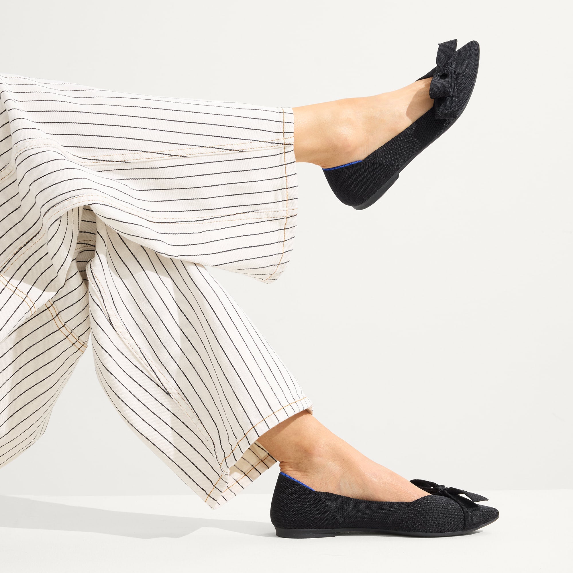 hover | Model wearing The Bow Point II in Siren.