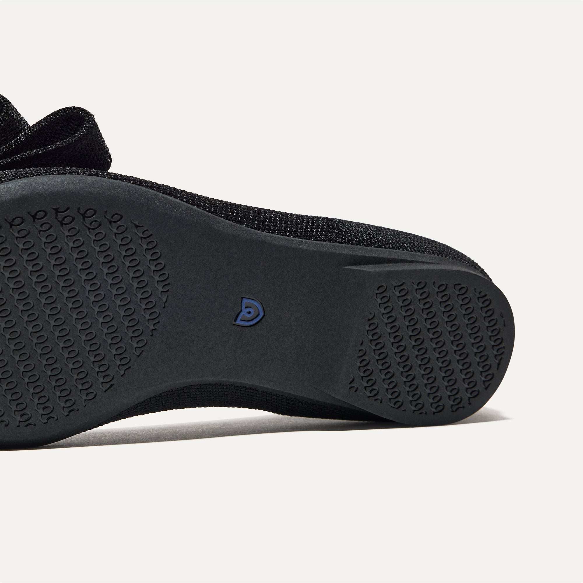 The sole of The Bow Point II in Siren shown in diagonal view.