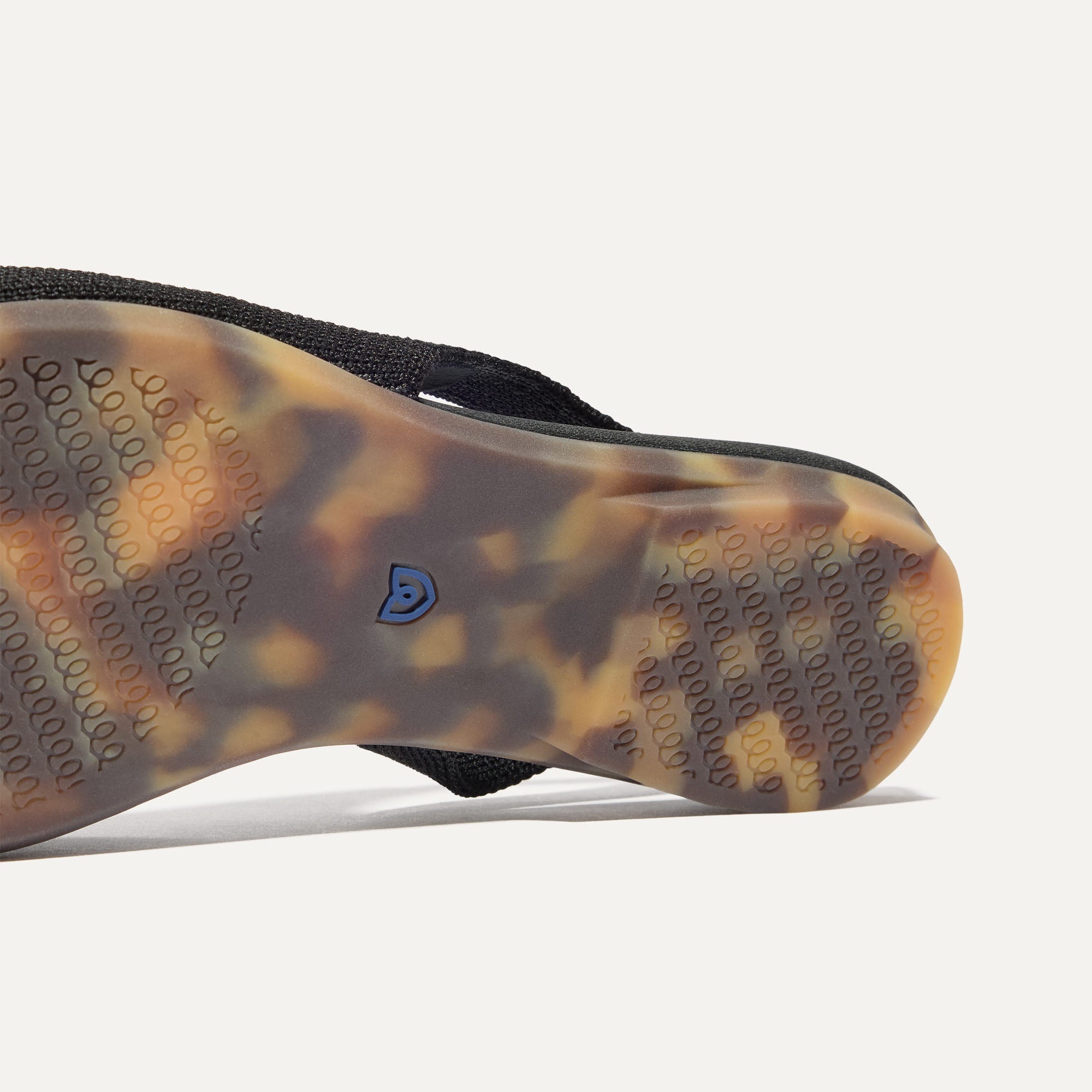 Close up of the outsole of The Almond Slingback in Black.