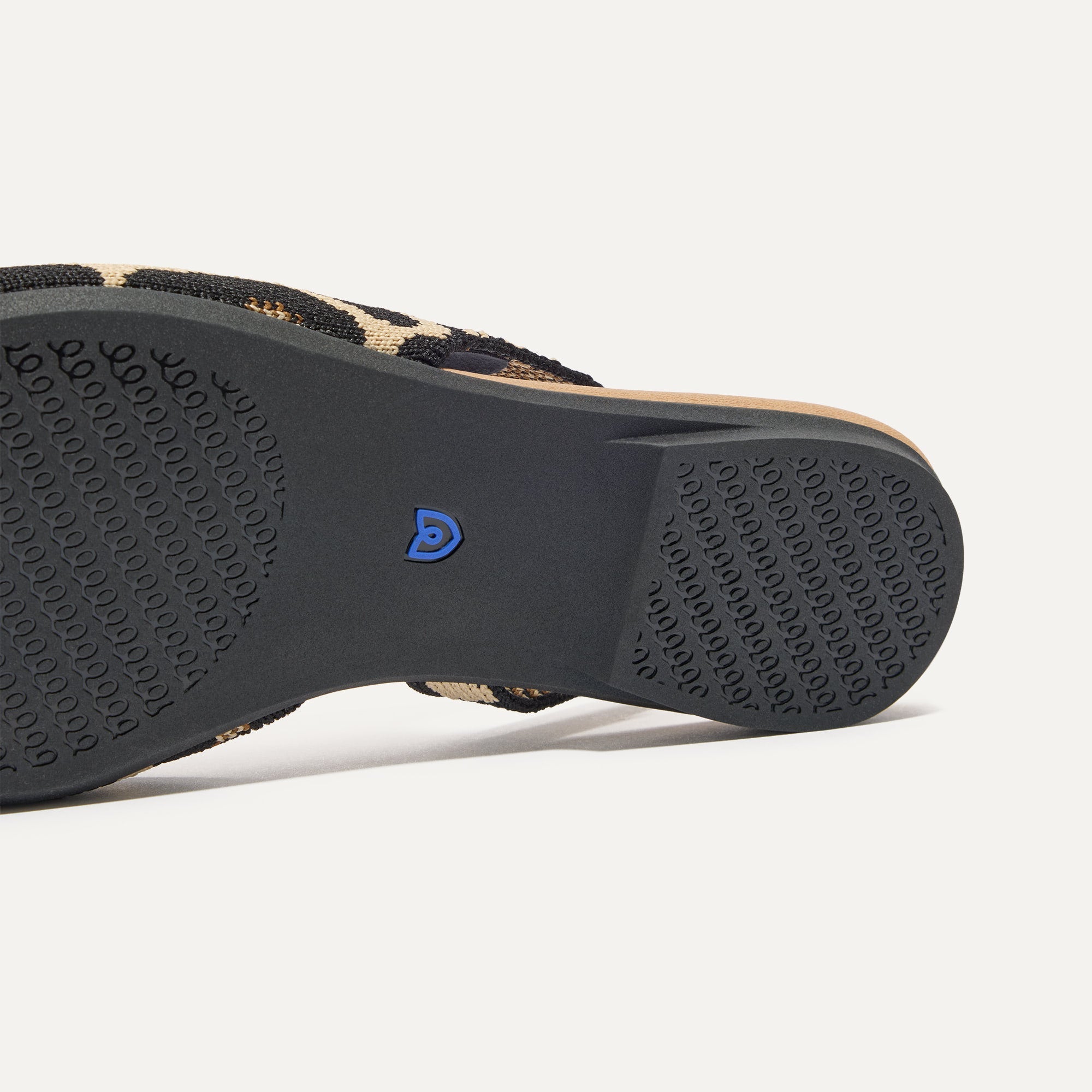 Close up of the outsole of The Almond Slingback in Desert Cat.