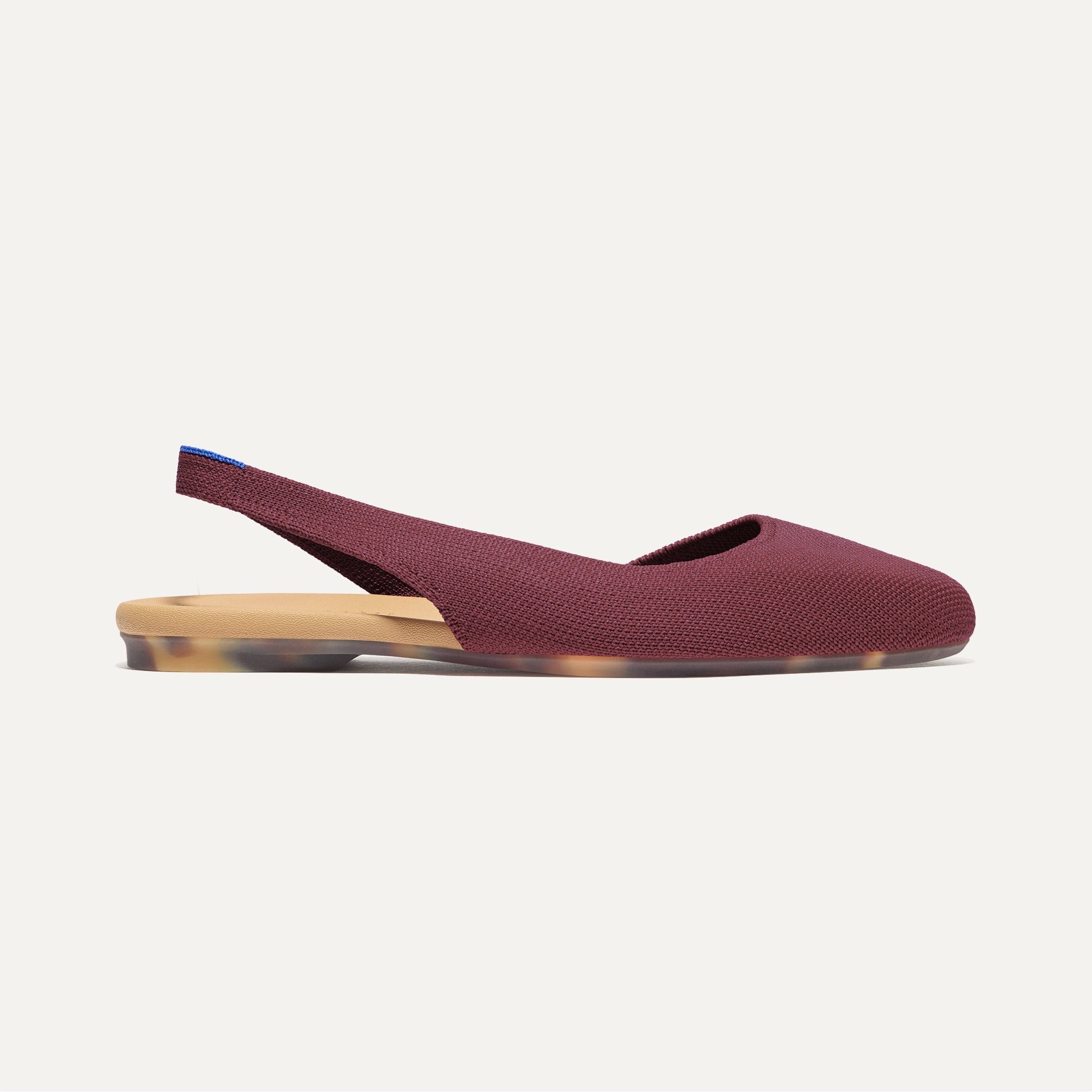 Side view of The Almond Slingback in Syrah.