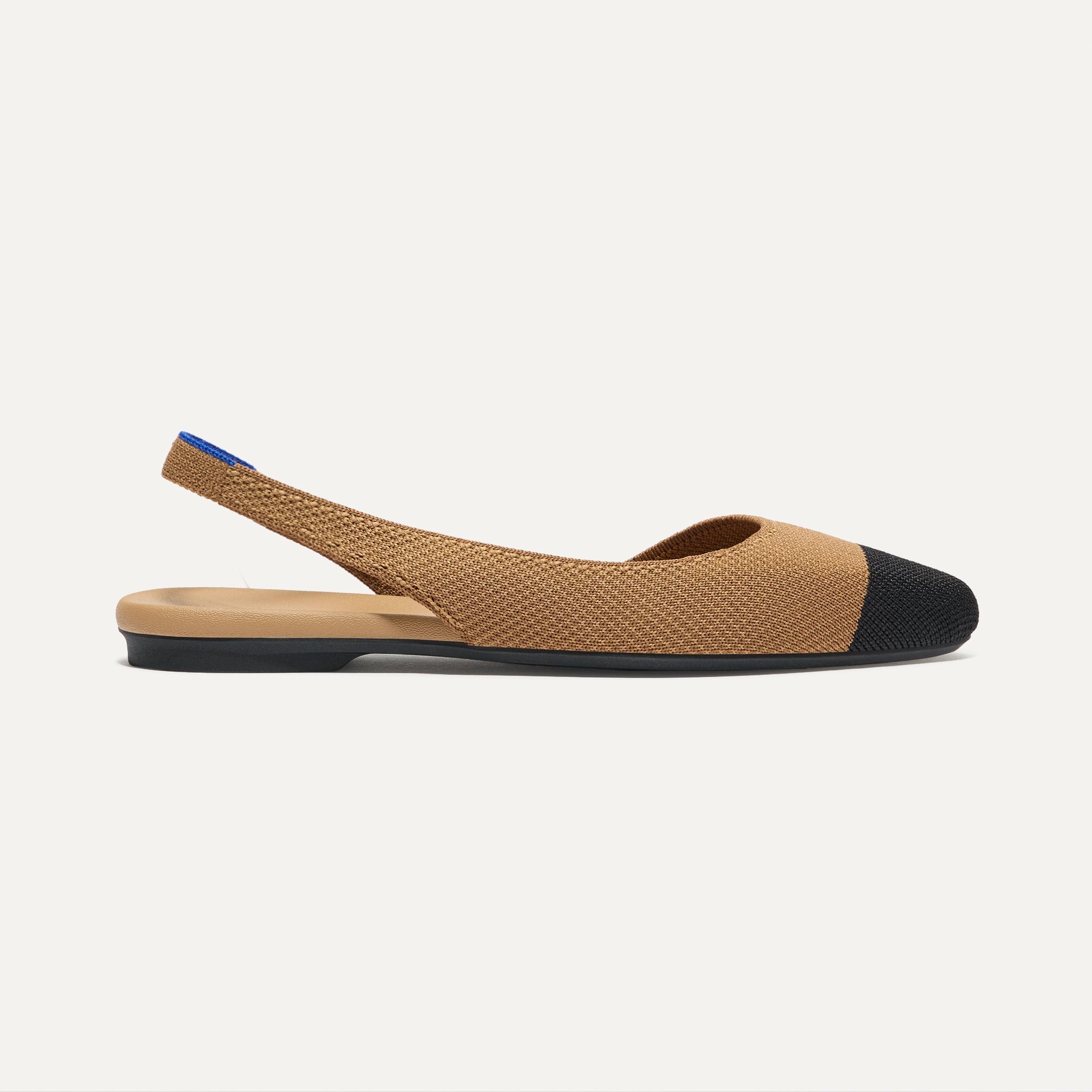 Side view of The Almond Slingback in Tawny Captoe.