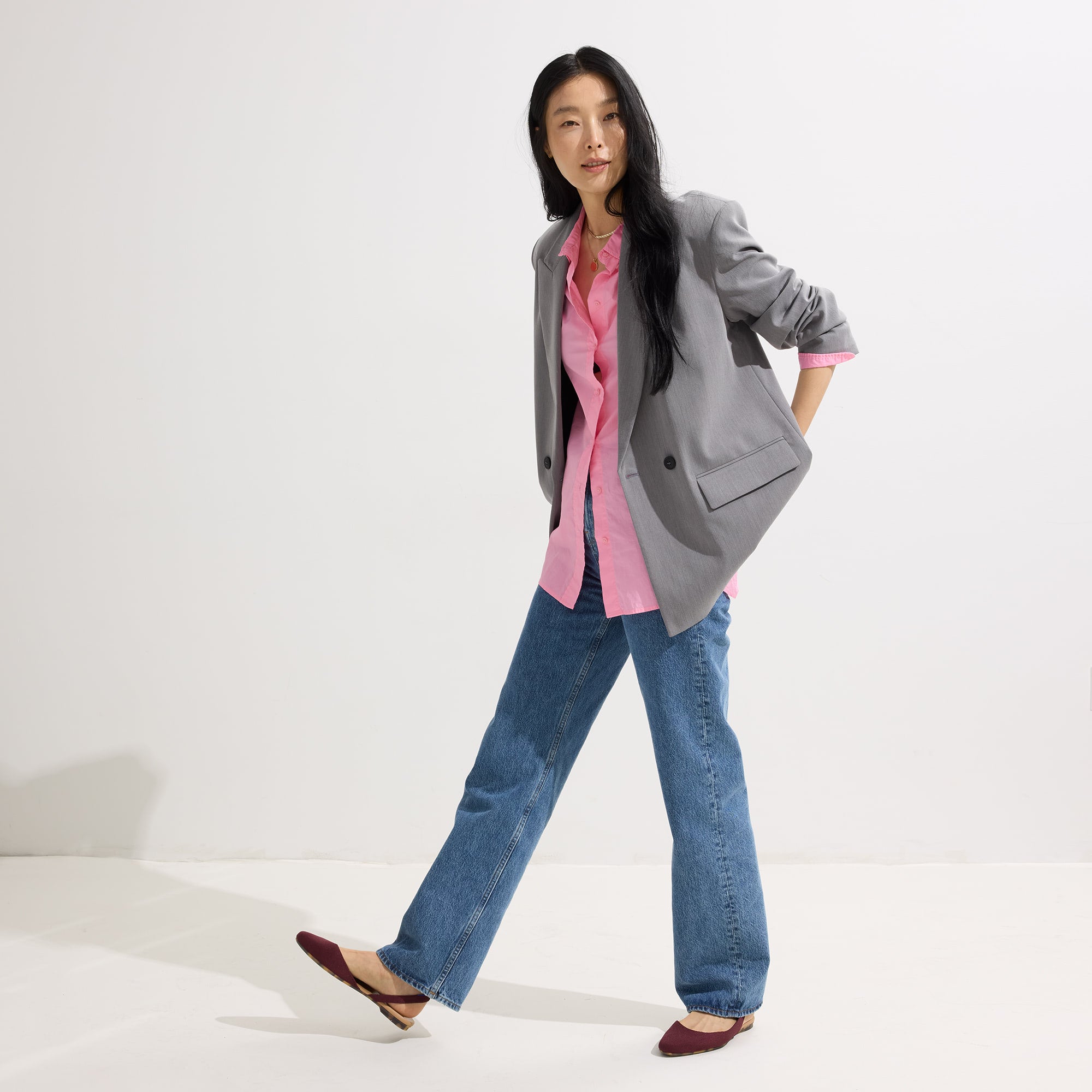 Alternate view of a model wearing The Almond Slingback in Syrah.