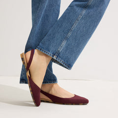 hover | Model wearing The Almond Slingback in Syrah.