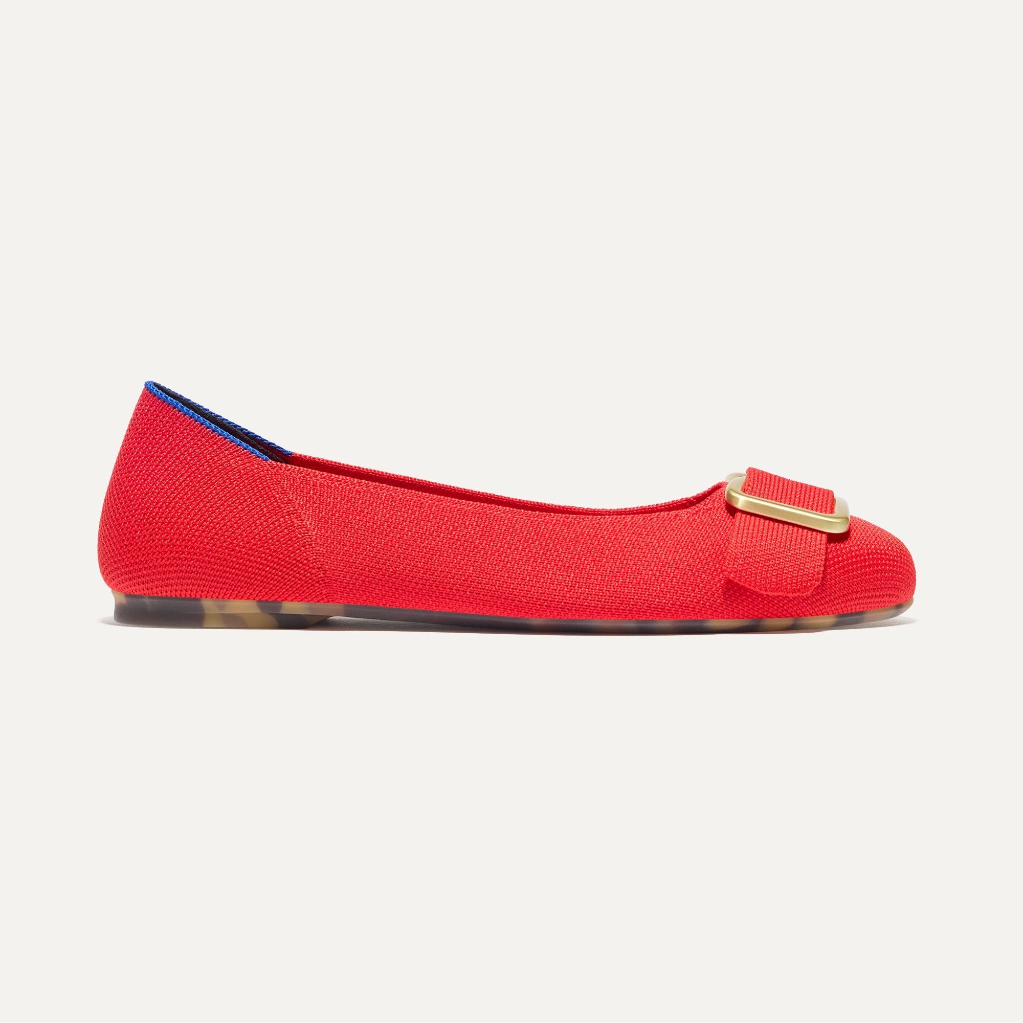 The Emblem Ballet Flat in Cardinal shown from the side.