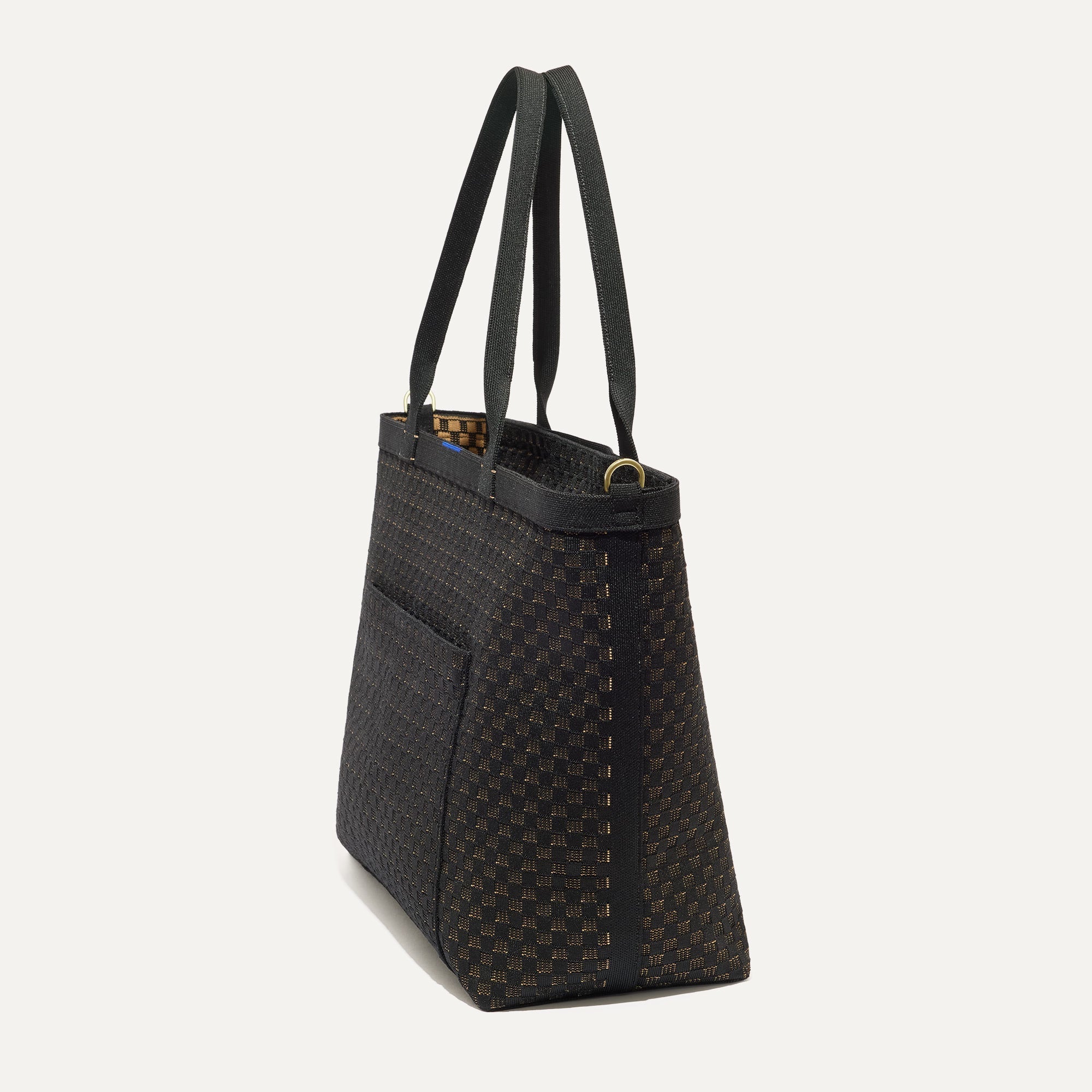 The Zip Travel Tote in Night Song shown from the side.